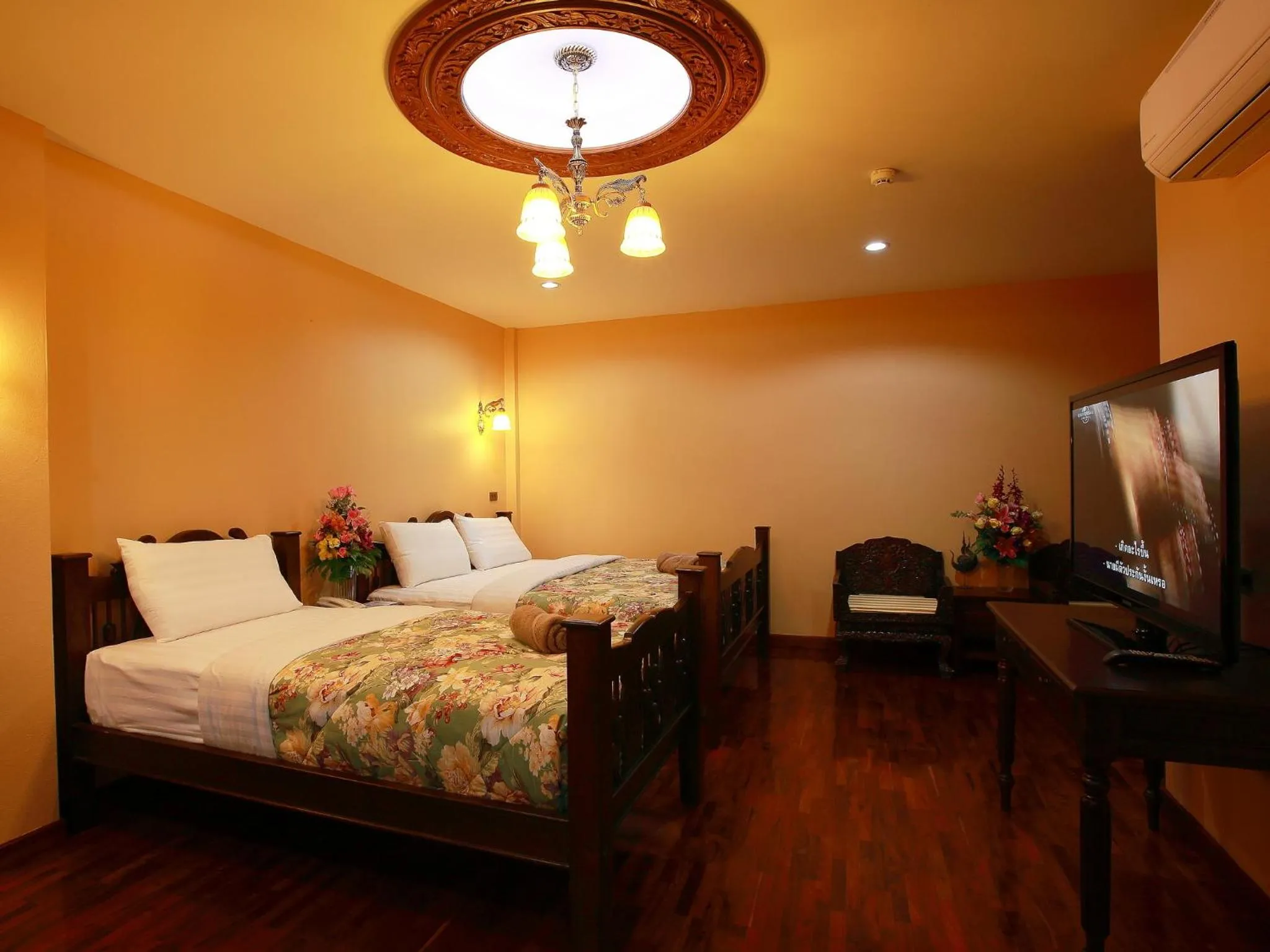 Bed in At Chiang Mai Hotel