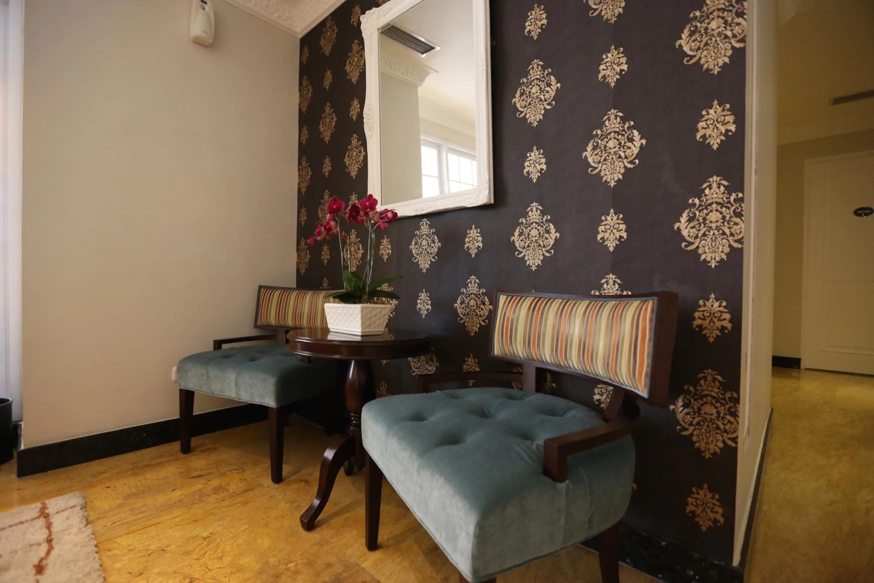 Communal lounge/ TV room in F Hotel Jakarta