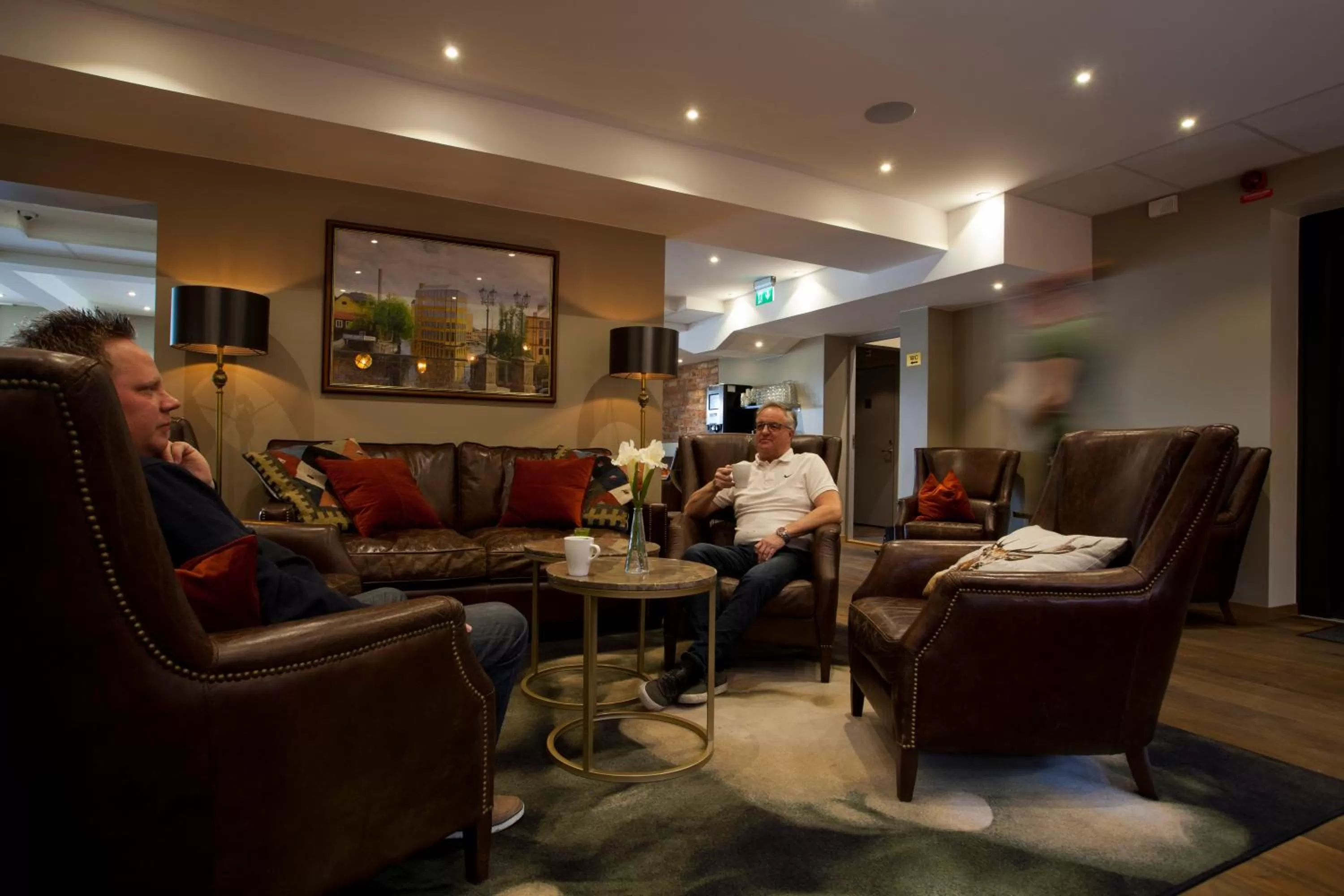 Communal lounge/ TV room in Hotell Nordic