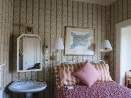 Bed in Mendocino Hotel & Garden