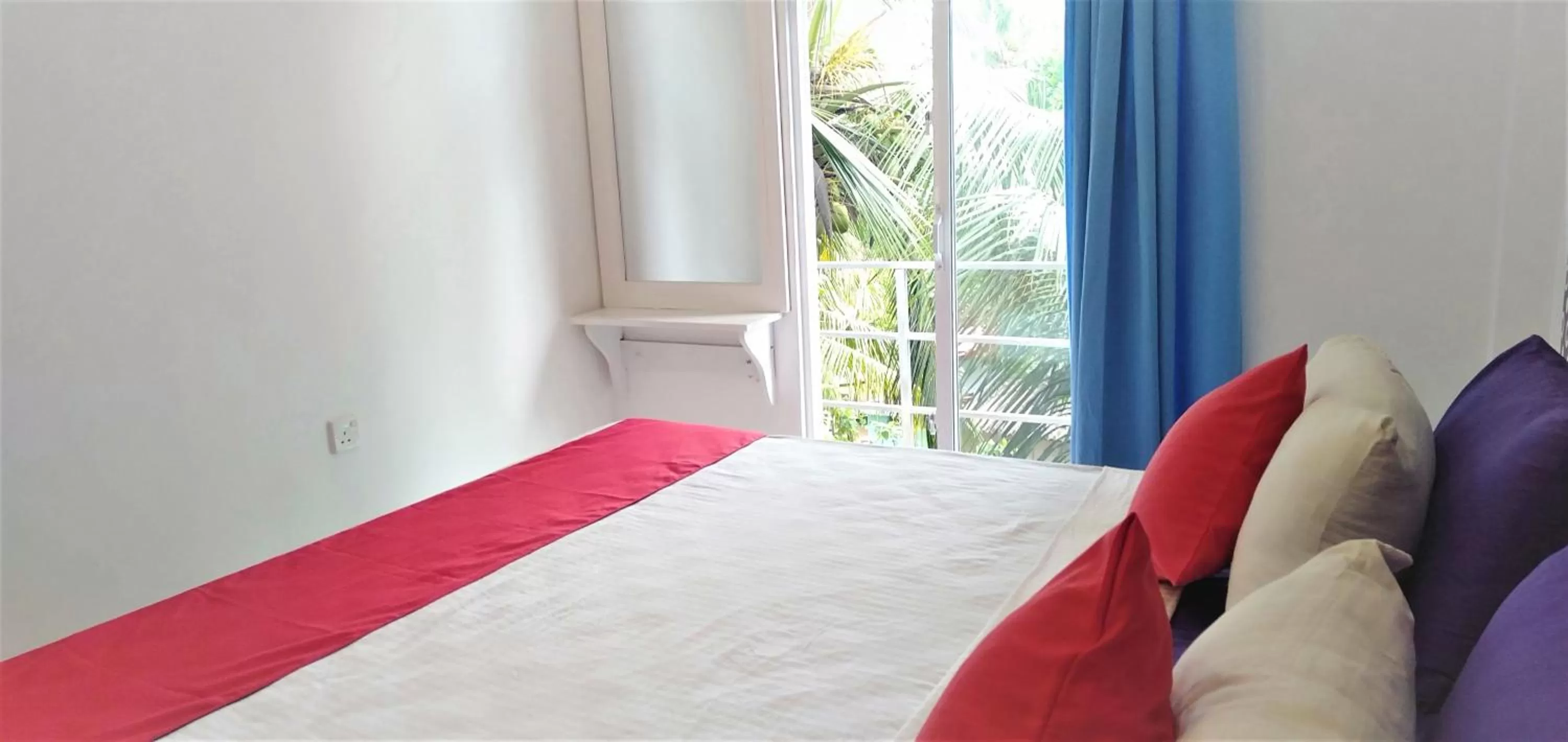 Bed in Ocean Bay Surf Resort Weligama