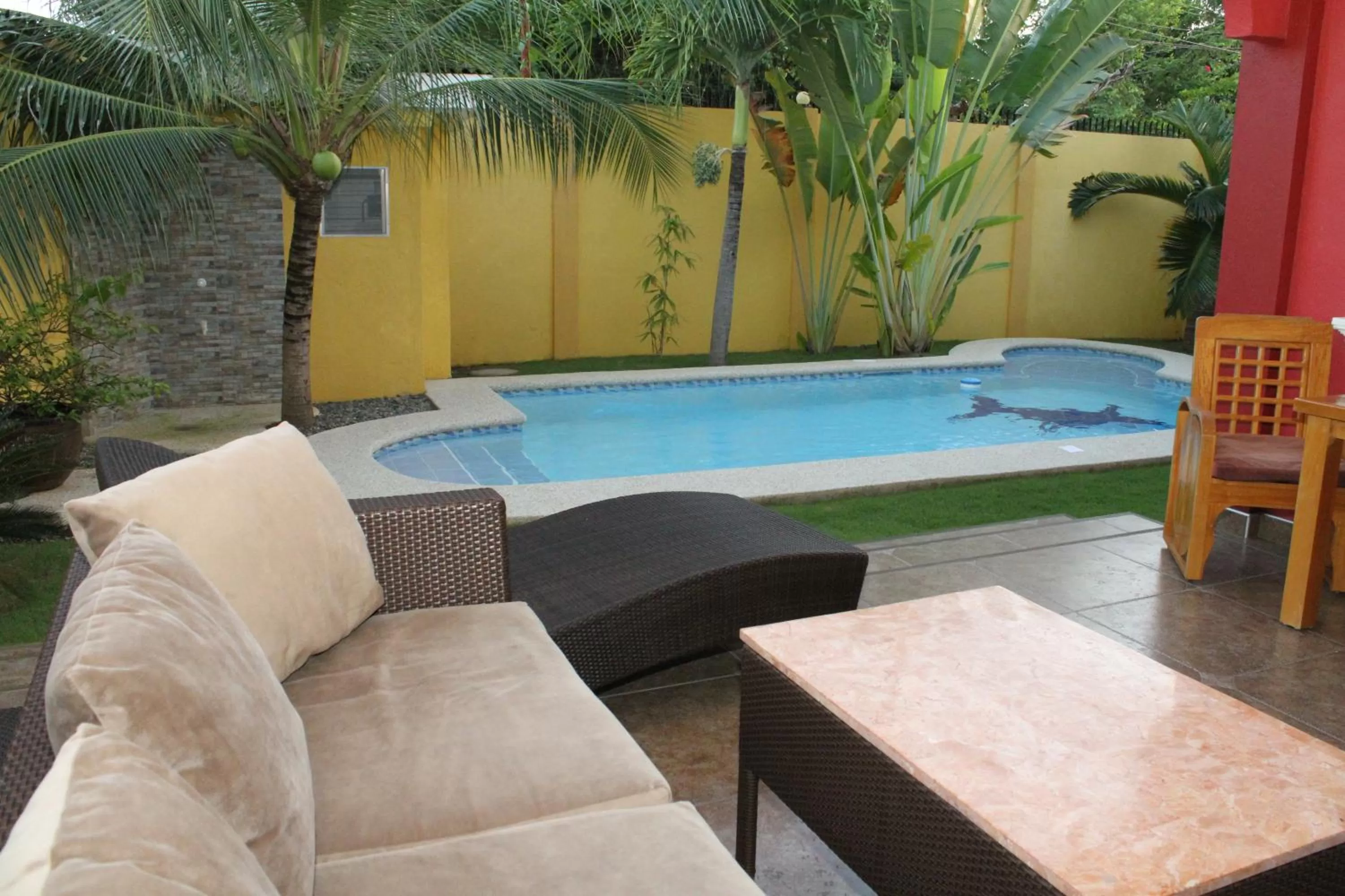 Balcony/Terrace, Swimming Pool in Alona's Coral Garden Resort (Adult-Only)