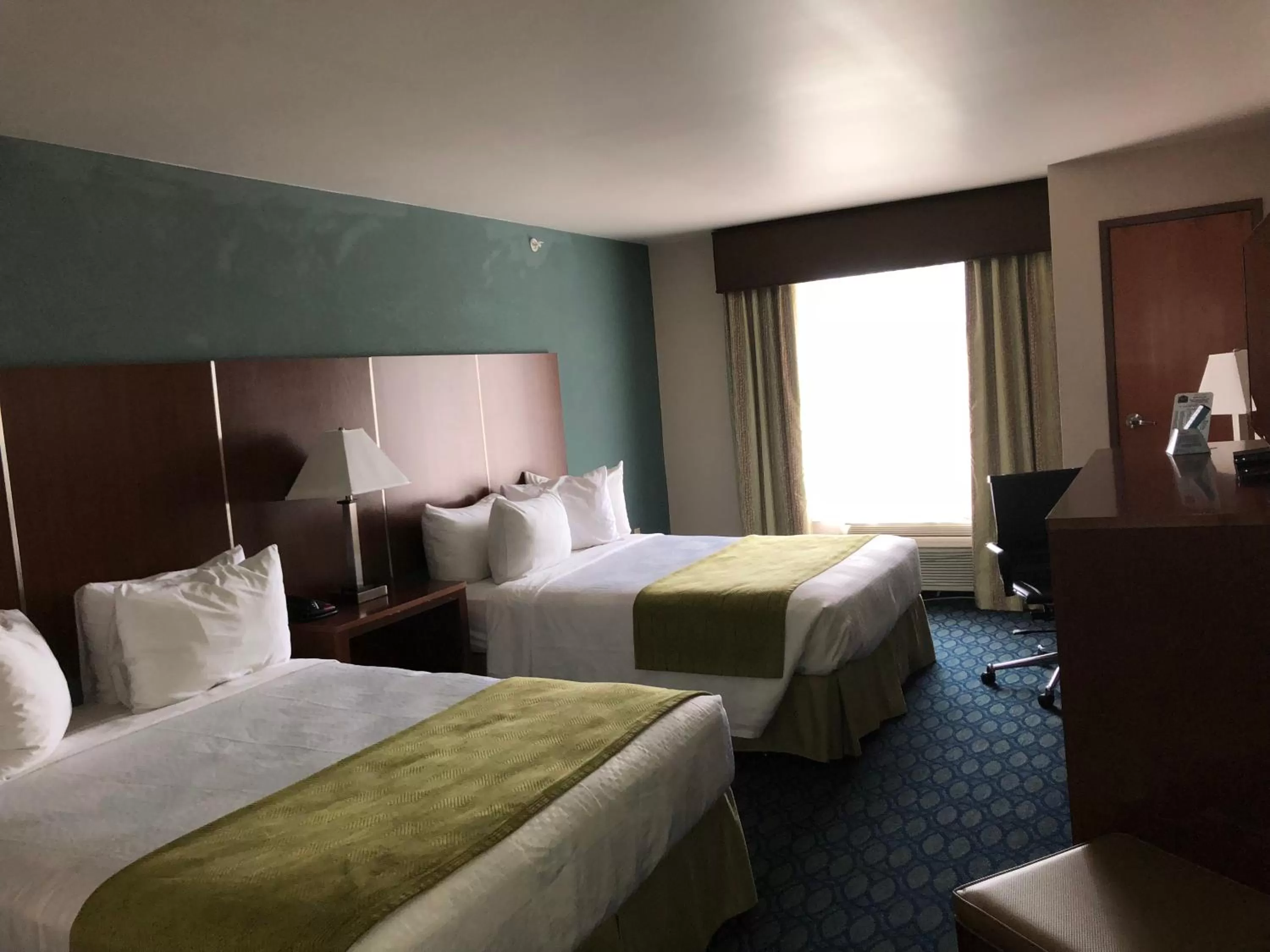 Bed in Countryview Inn & Suites