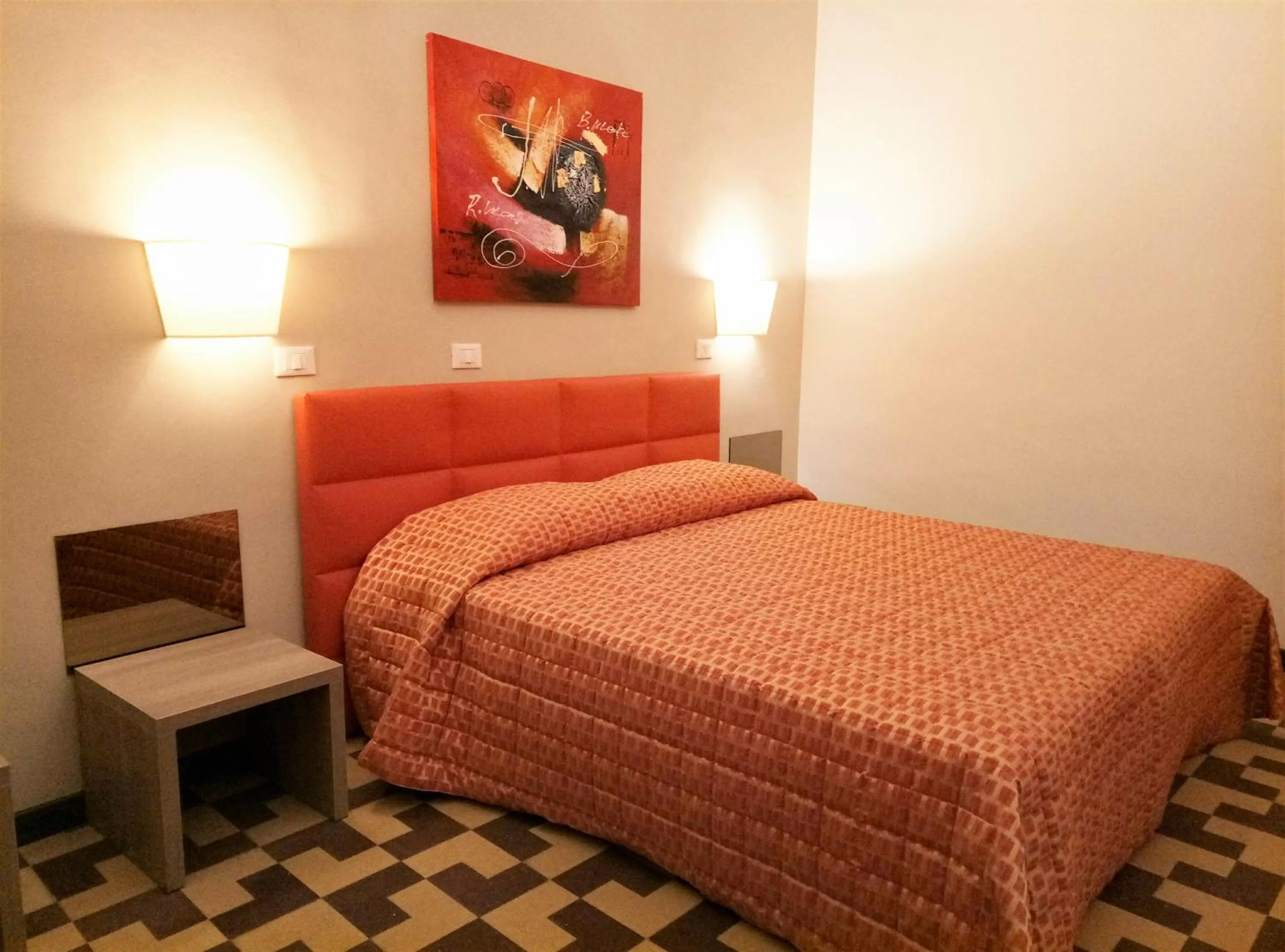 Bedroom in Moonlight Hotel&Suites