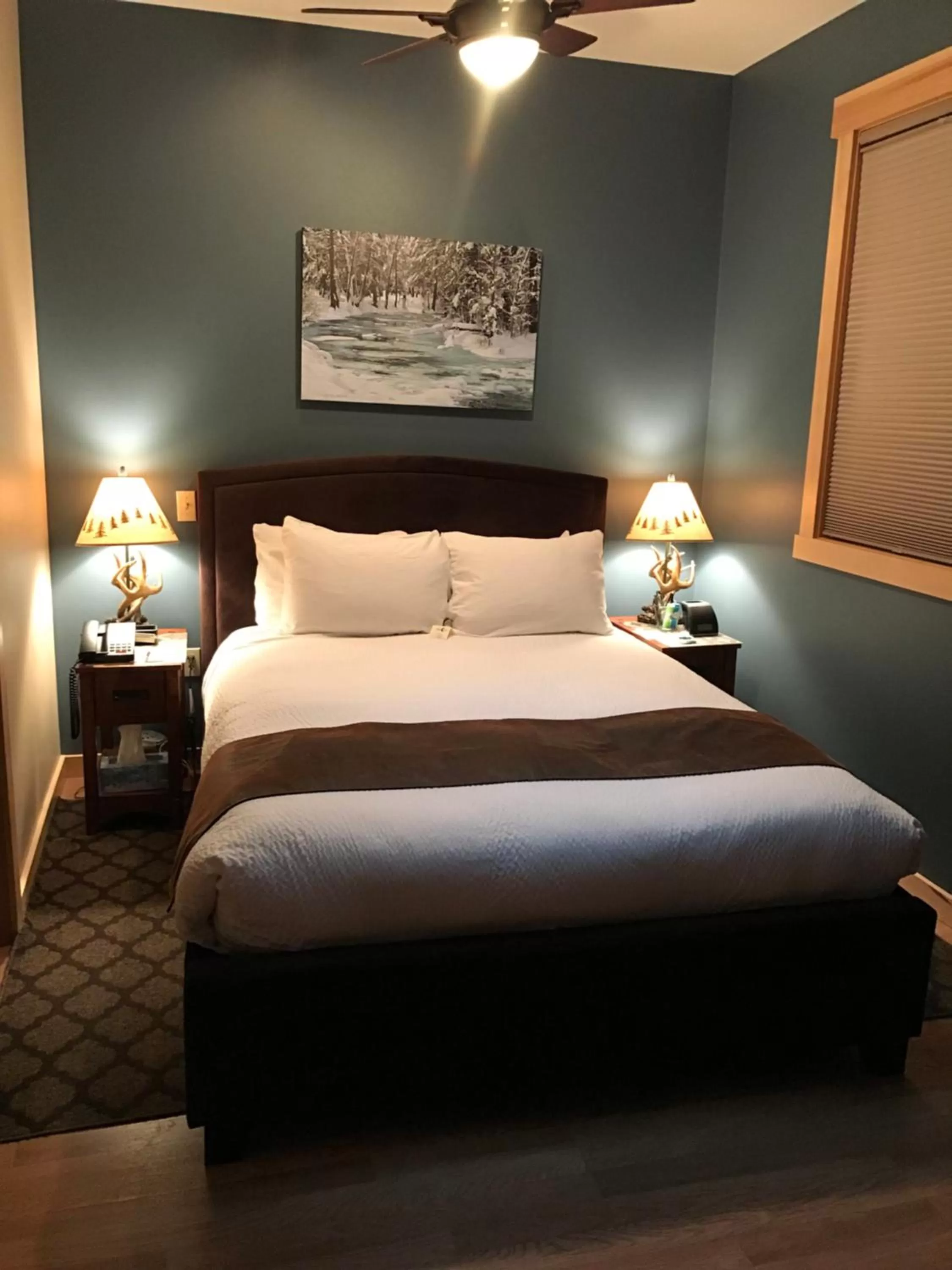 Bed in Twisp River Suites