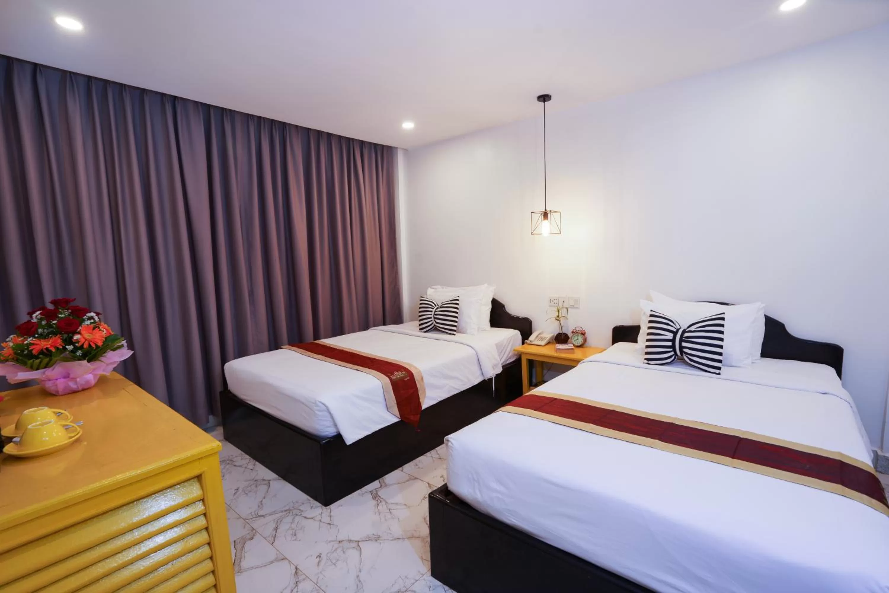 Bed in The Rabbit Hole Hotel & SPA