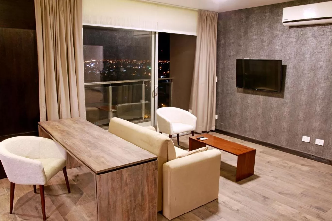 Seating area in Urban Suites Apart Hotel