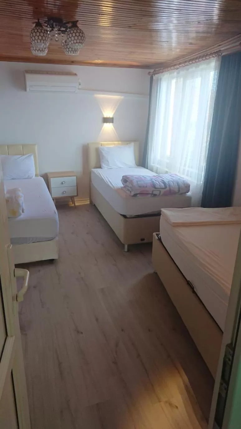 Bed in Ali's Pension