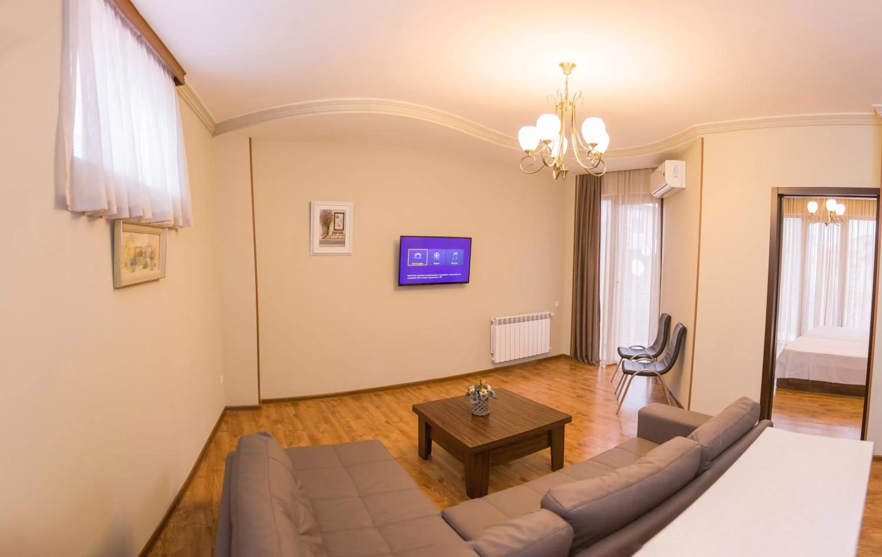 TV and multimedia, Seating Area in Royal Venezia Hotel