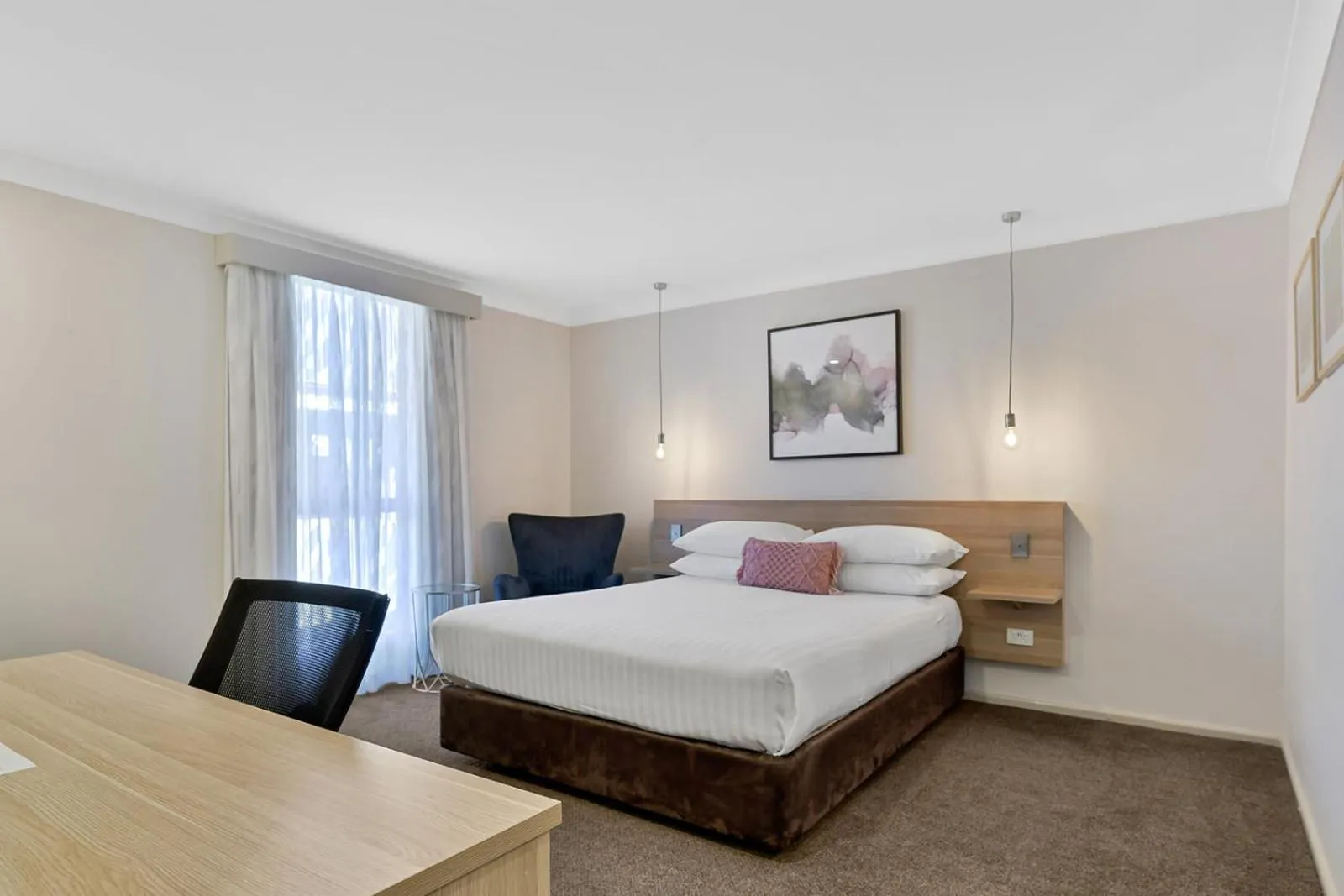 Bed in Central Caleula Motor Lodge