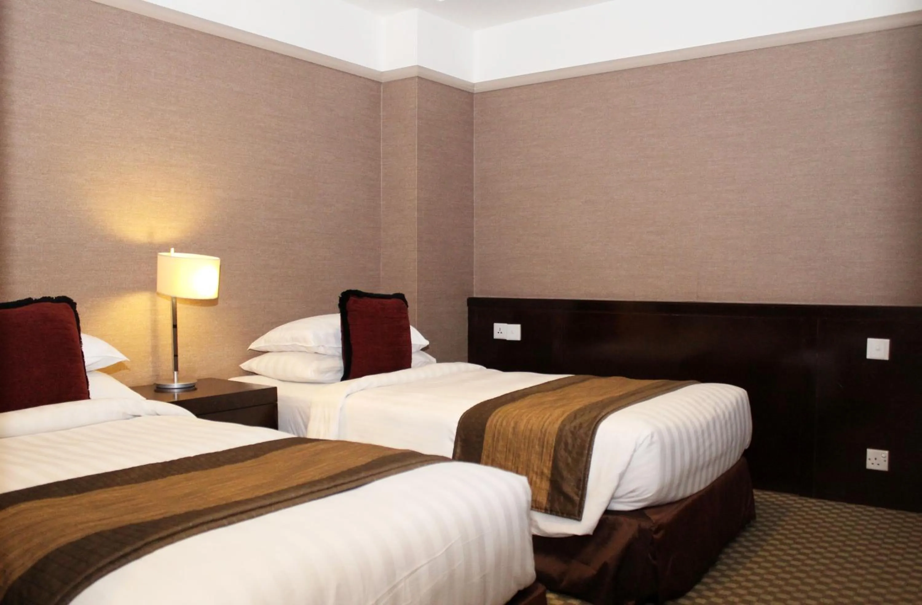 Bedroom in Pacific Regency Hotel Suites