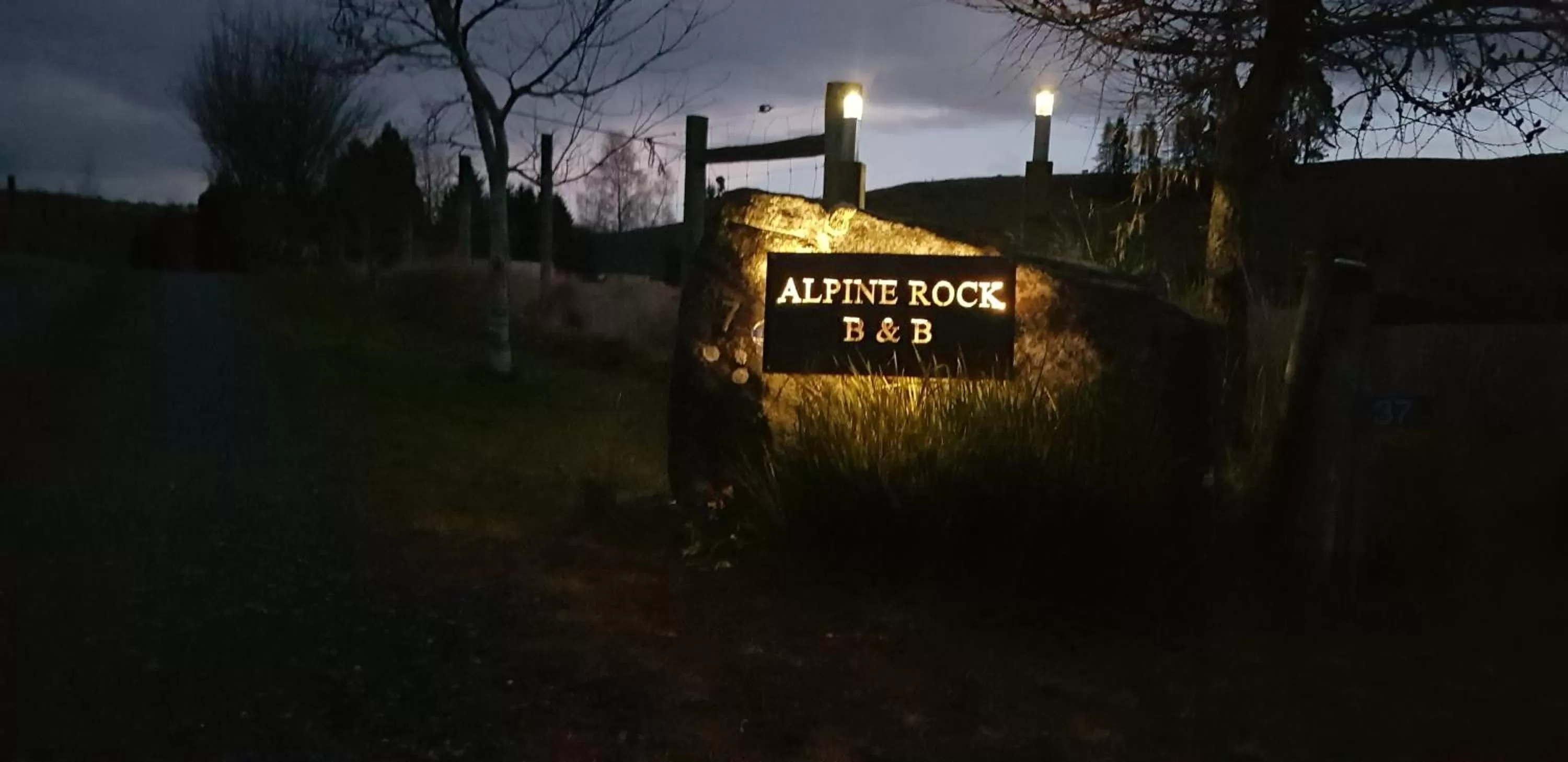 Property logo or sign in Alpine Rock B&B