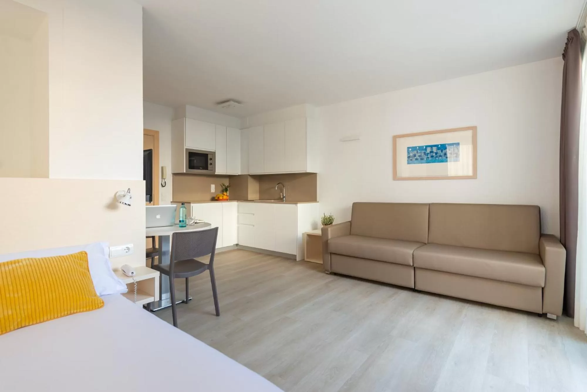Kitchen or kitchenette in Atenea Park Suites & Apartments