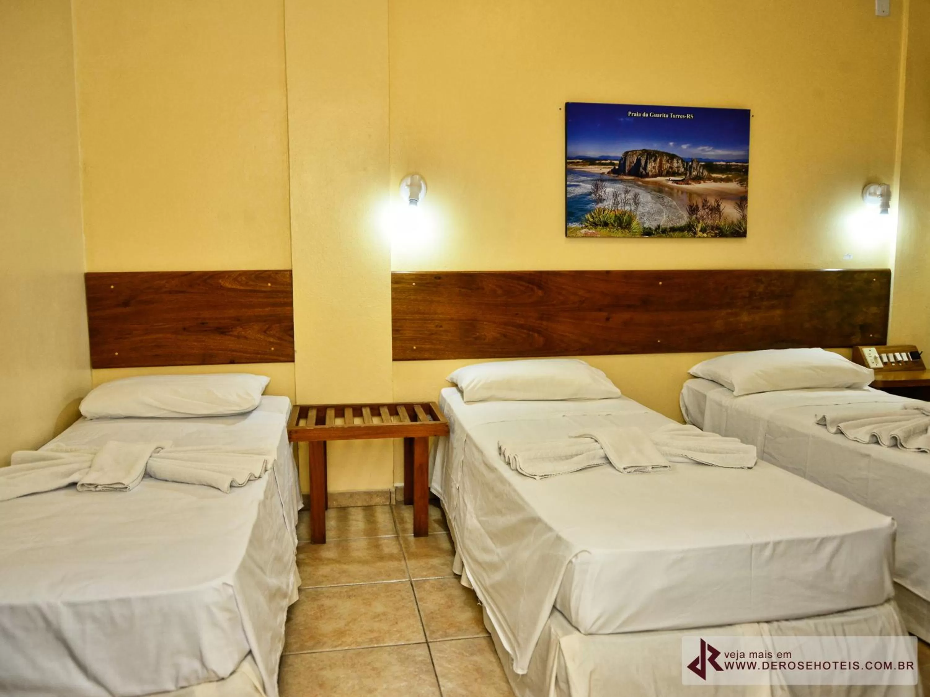 Bed in De Rose Palace Hotel