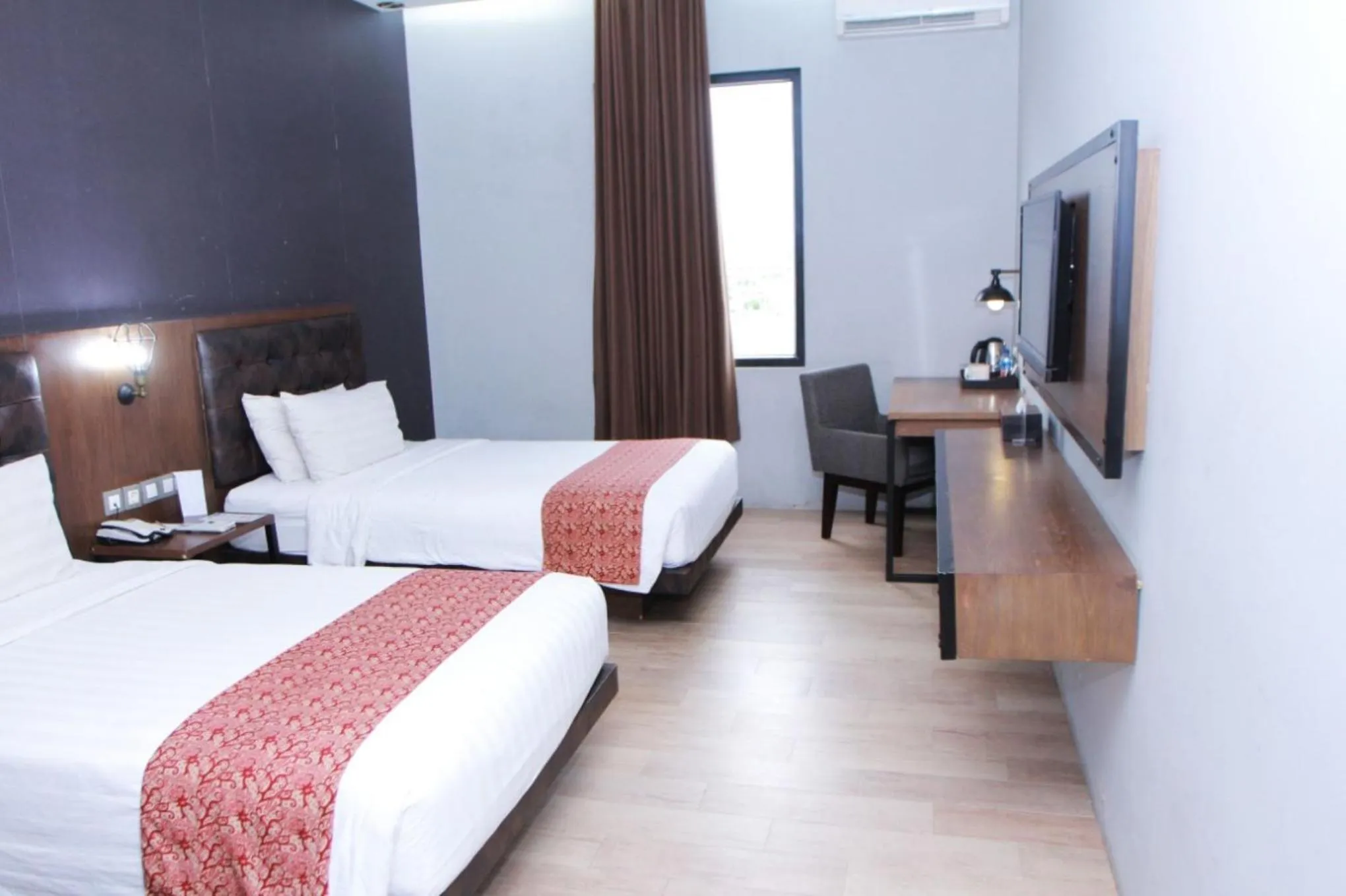 Bed in Grand Kangen Hotel Urip Sumoharjo