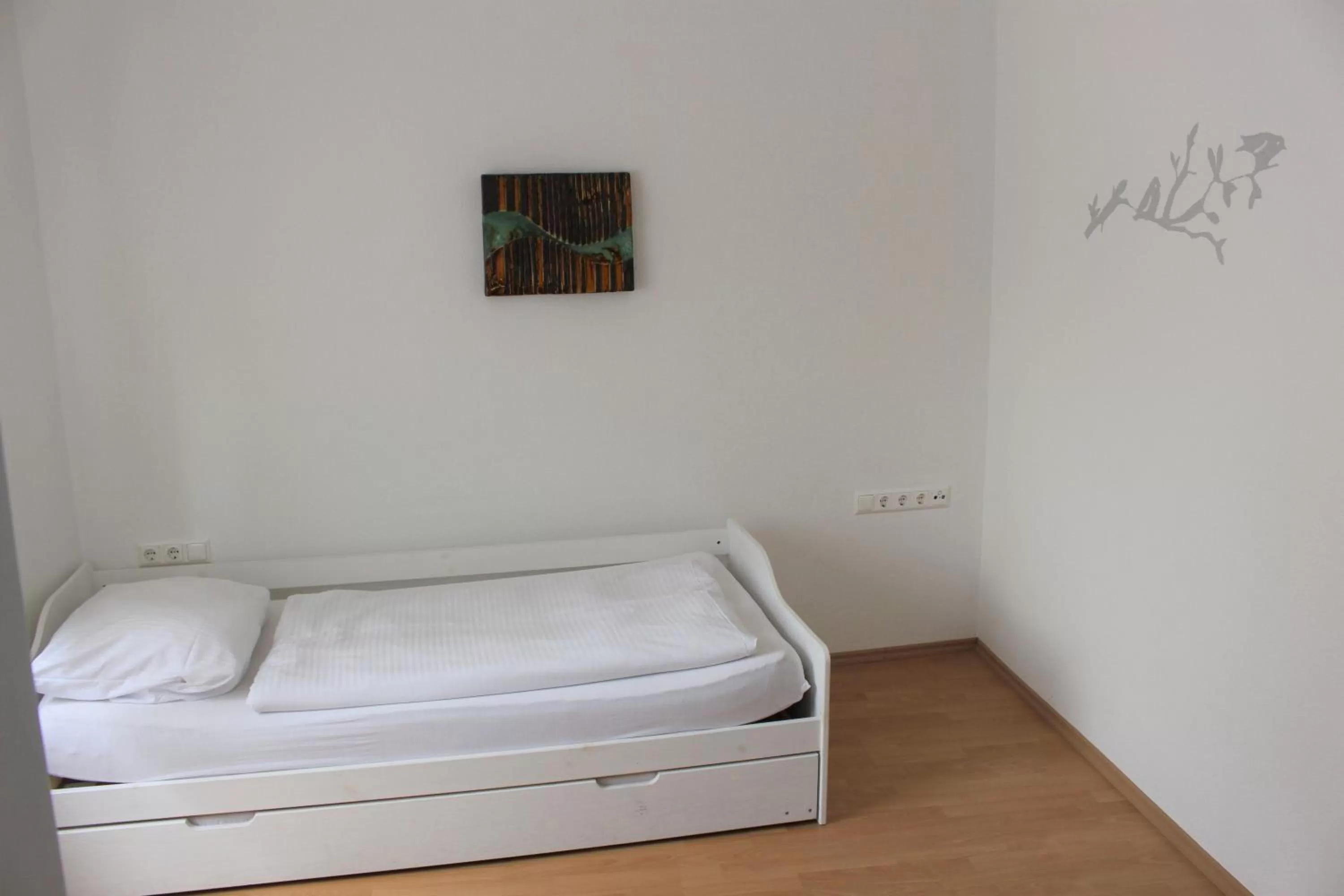 Bed in Hotel Ulmer Spatz