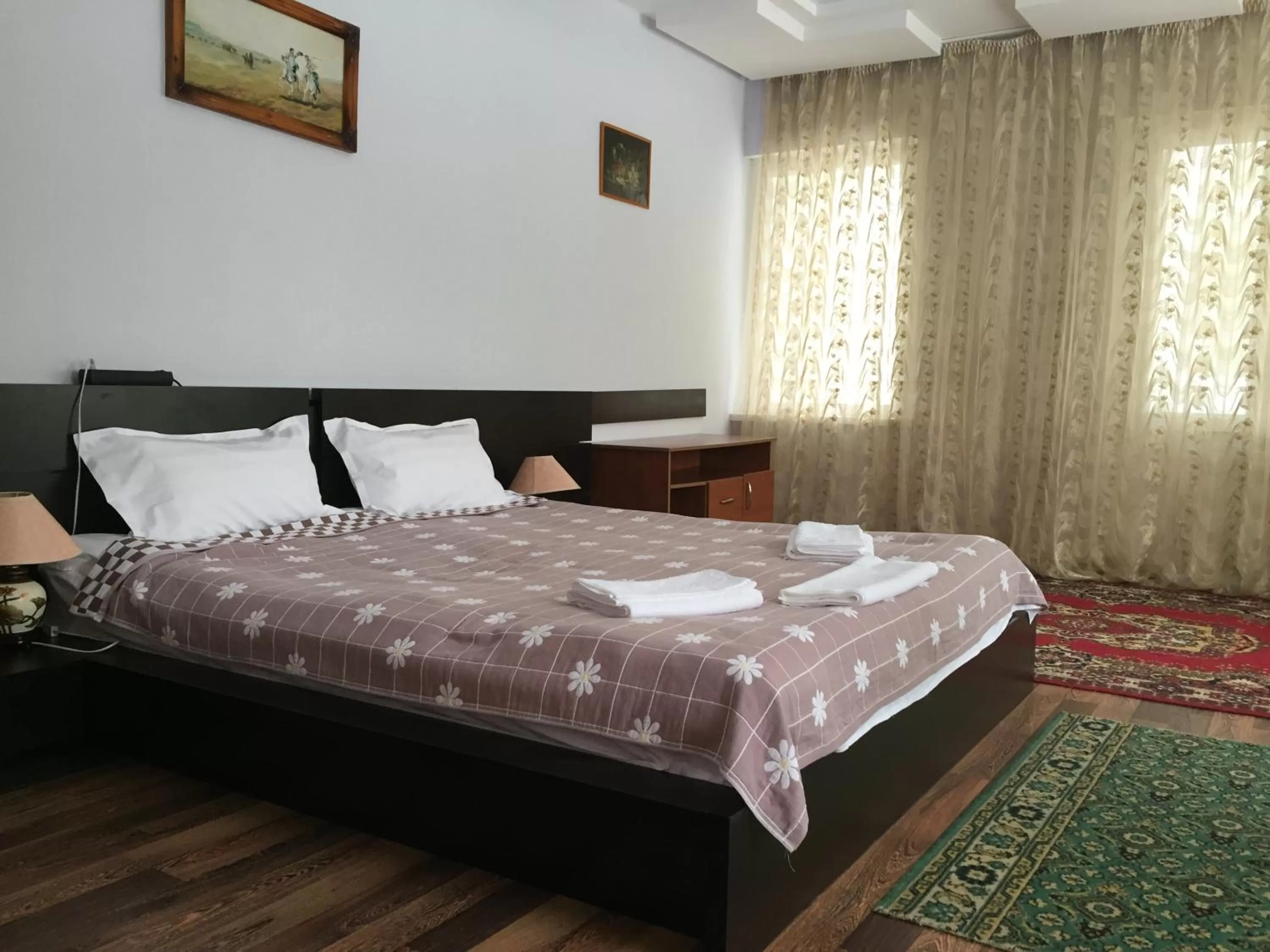 Bed in Zhaylau Hotel