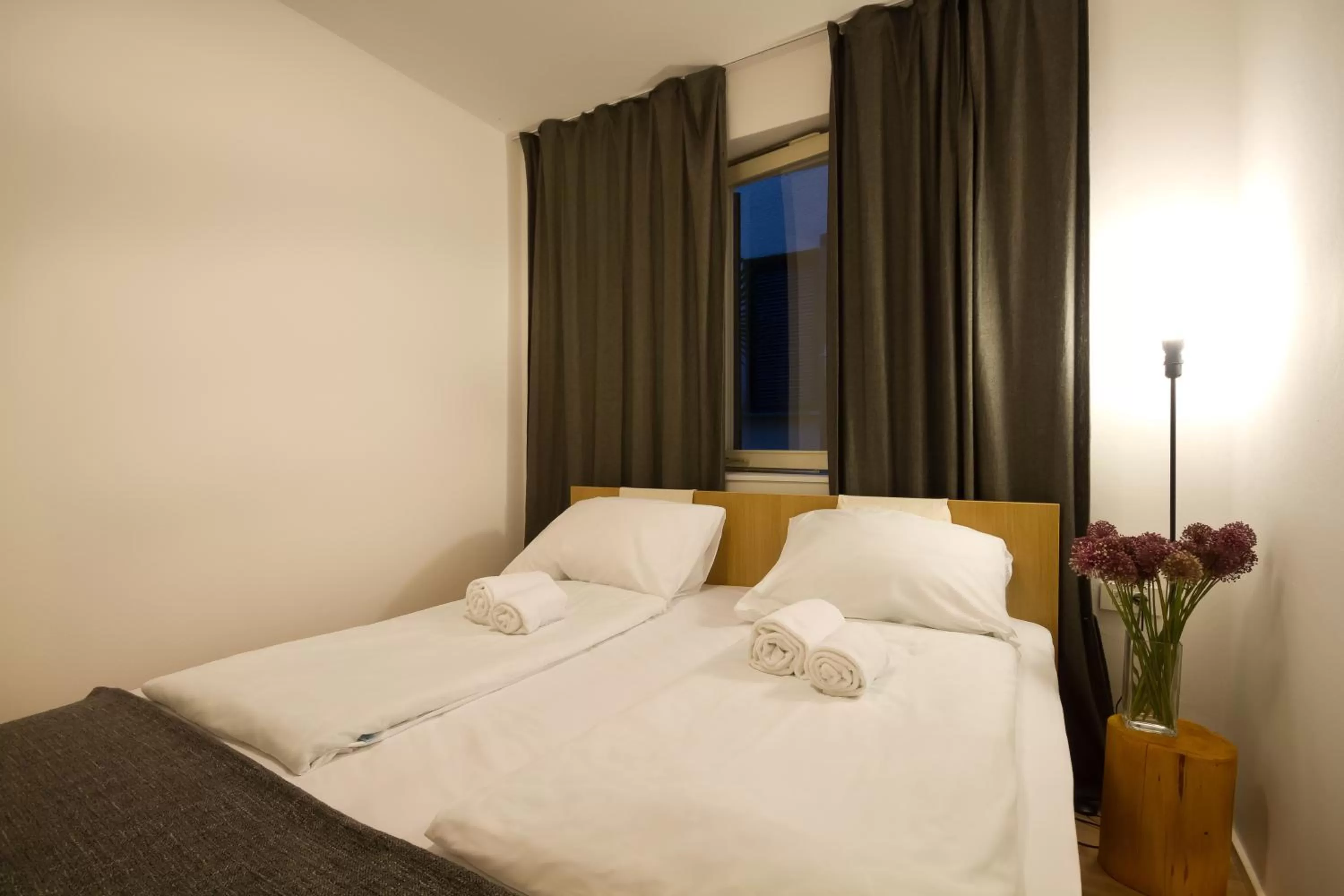 Bed in Forgotten Garden Apartments Portoroz