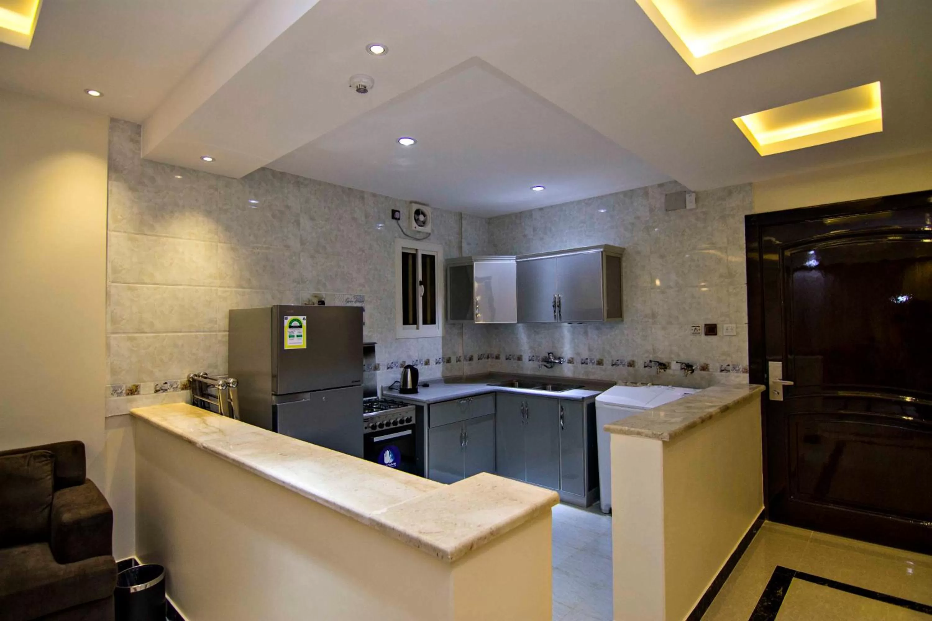 Kitchen/Kitchenette in Dreams Houses furnished Suites