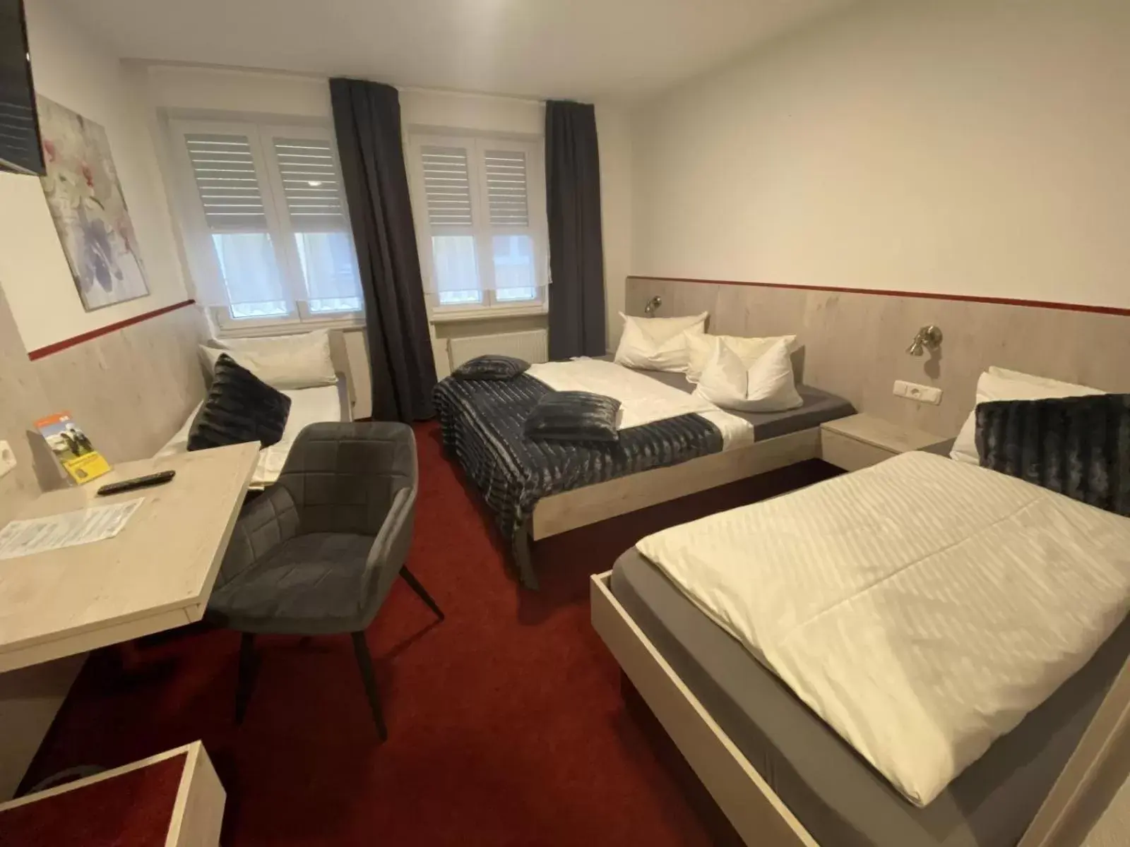 Quadruple Room in Hotel Wilder Mann Quadruple Room in Hotel Wilder Mann