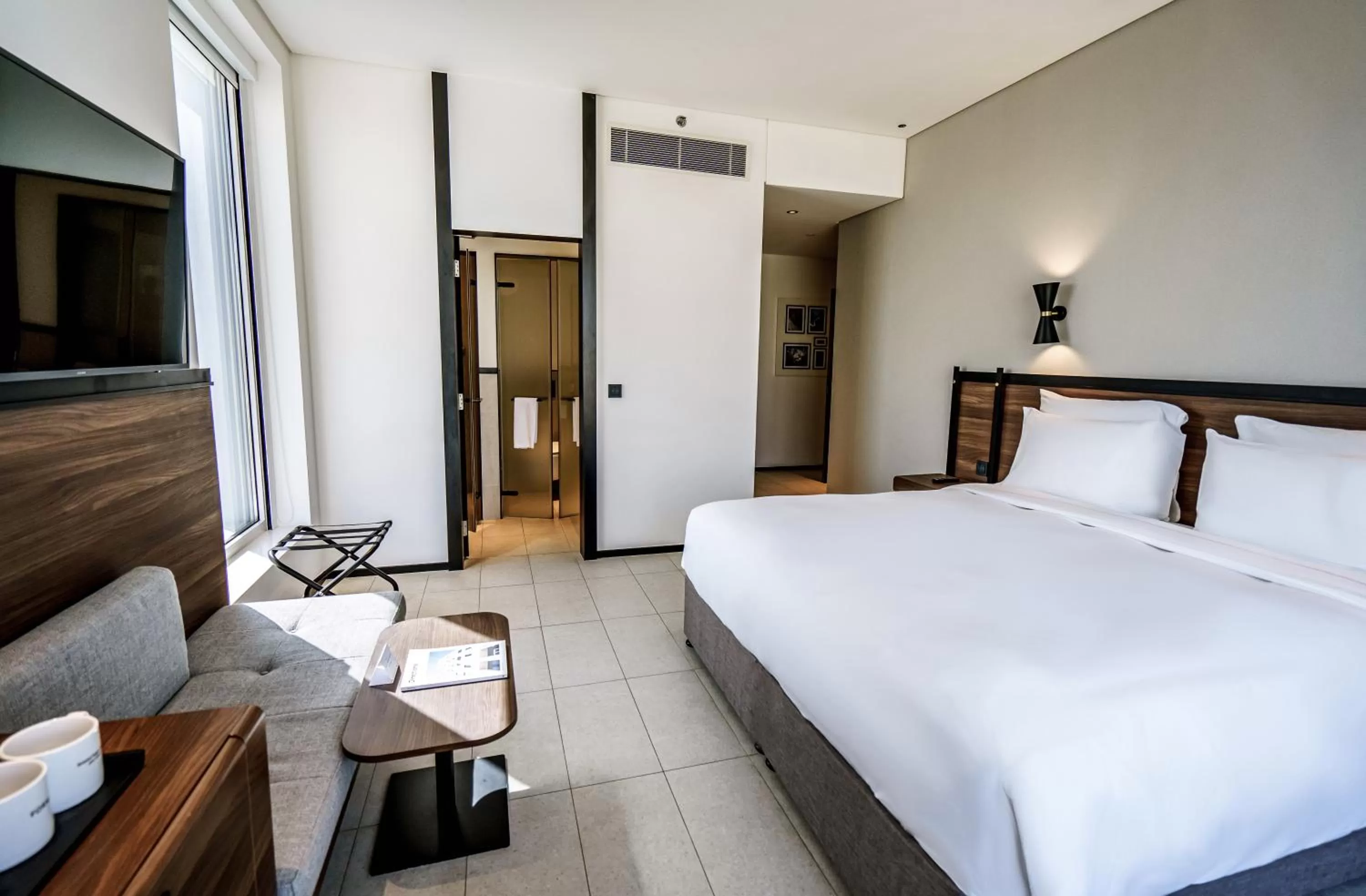 Bedroom, Bed in FORM Hotel Al Jaddaf, Dubai, a Member of Design Hotels