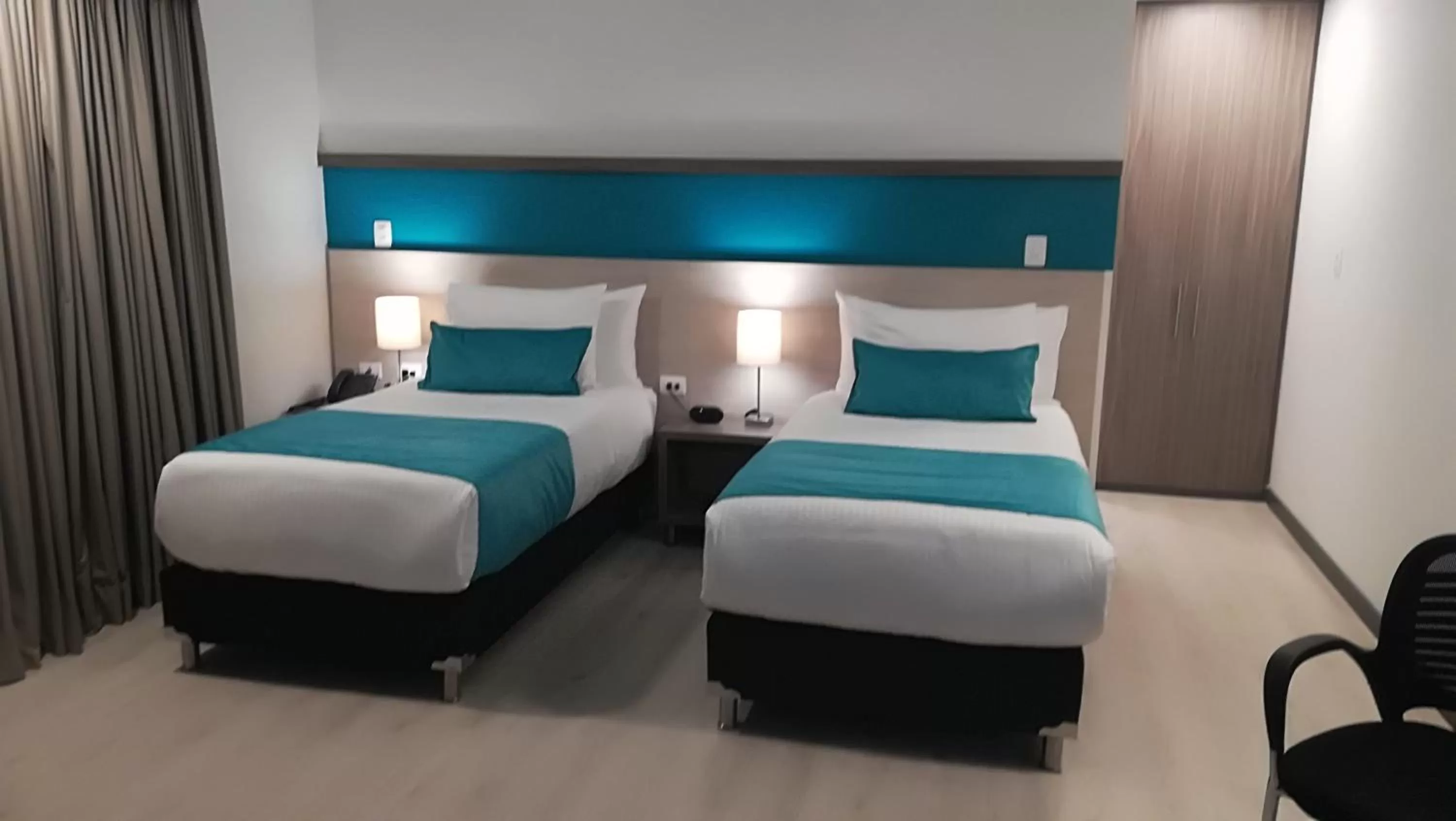 Bed in Hotel Nivari Duitama