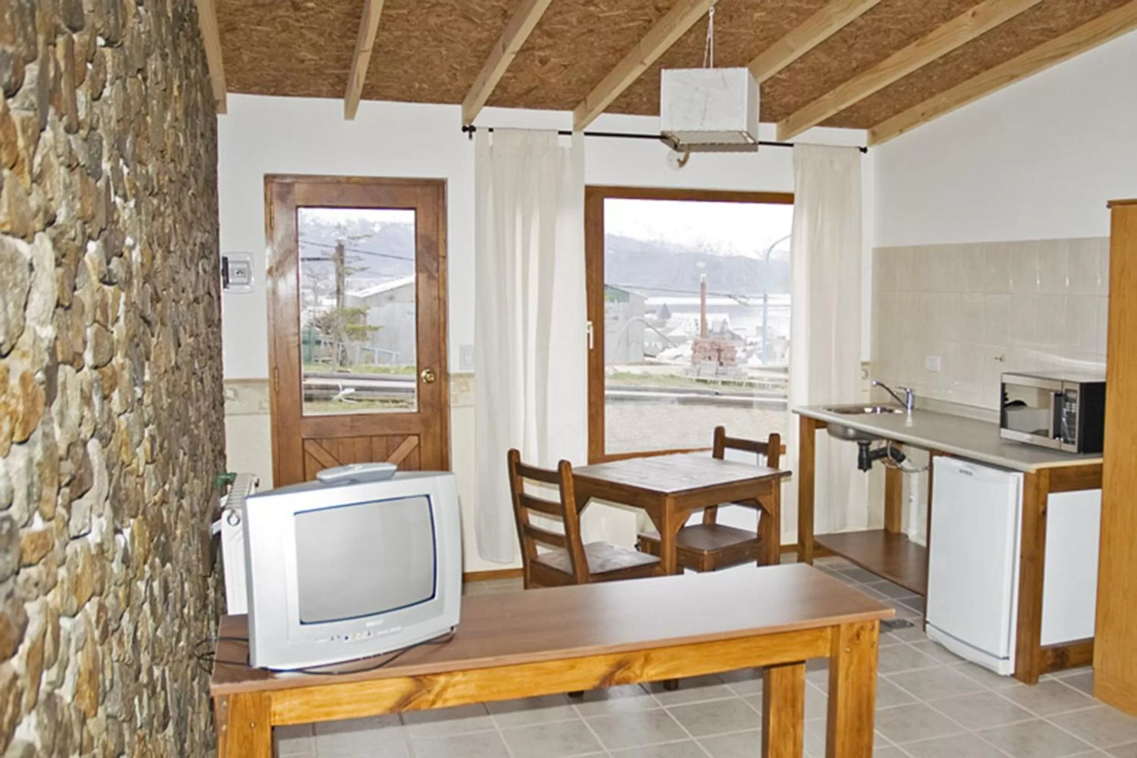 Living room, TV/Entertainment Center in Hosteria Sloggett