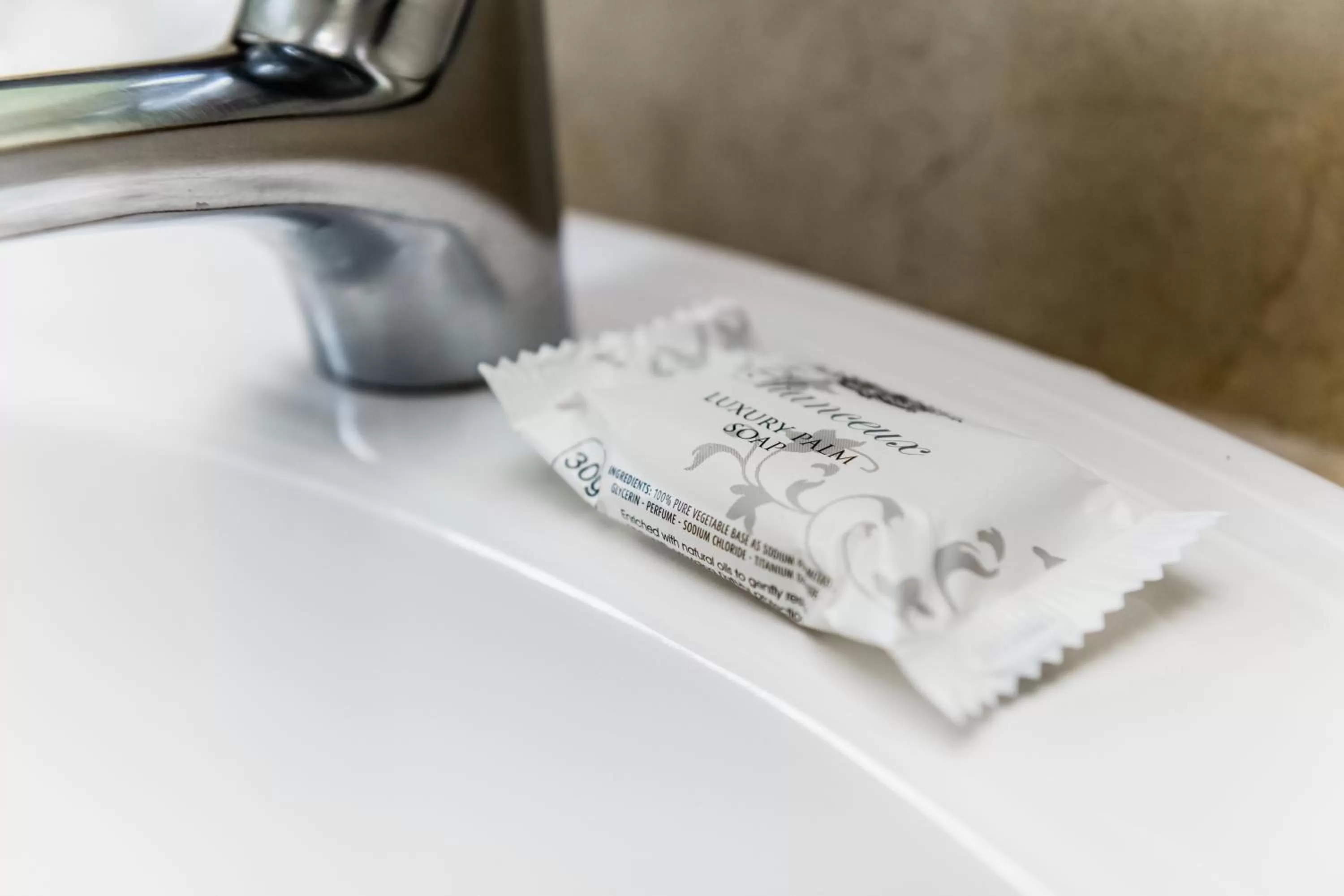Bathroom in Belaire Suites Hotel