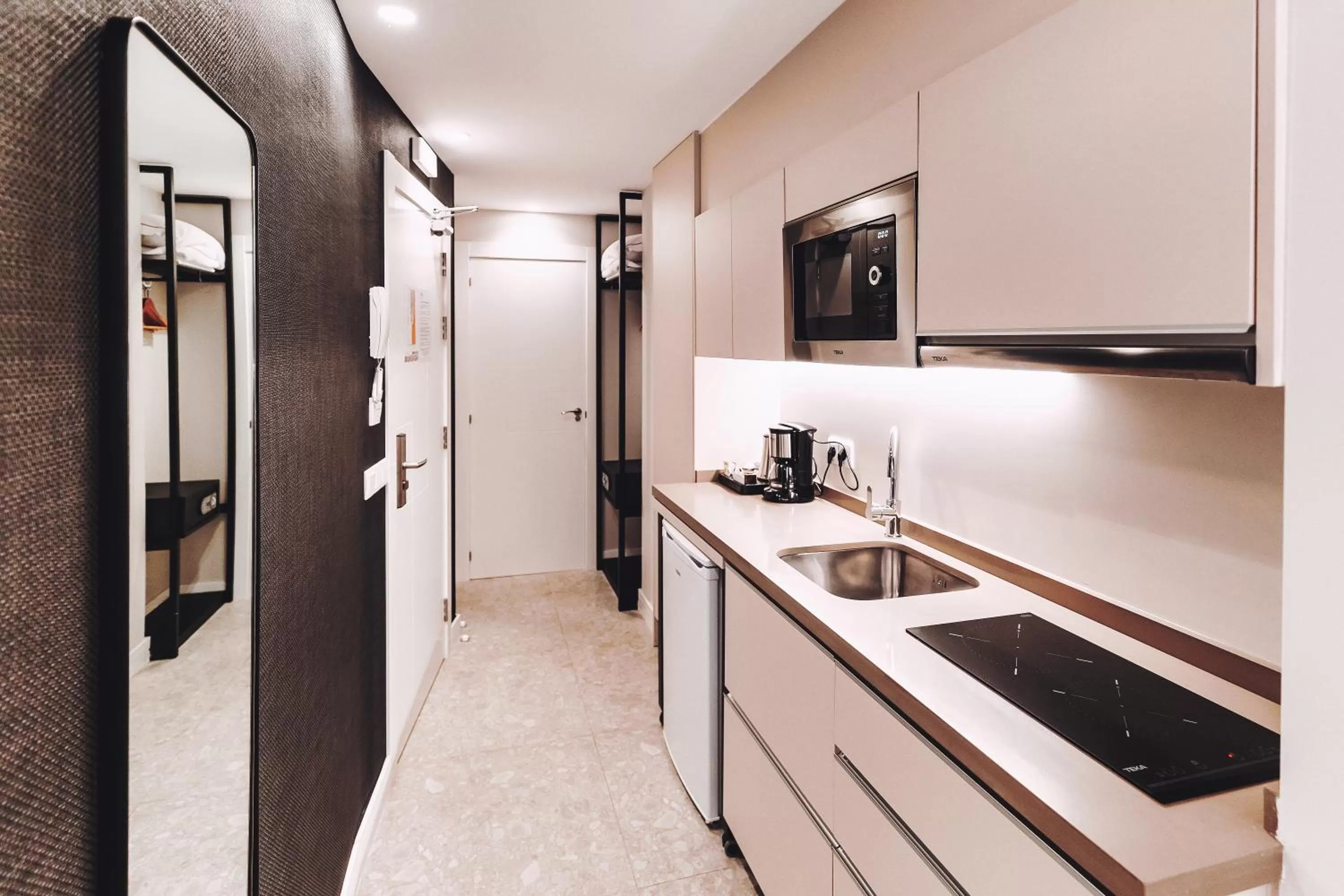 Kitchen or kitchenette in Posidonia Aparthotel