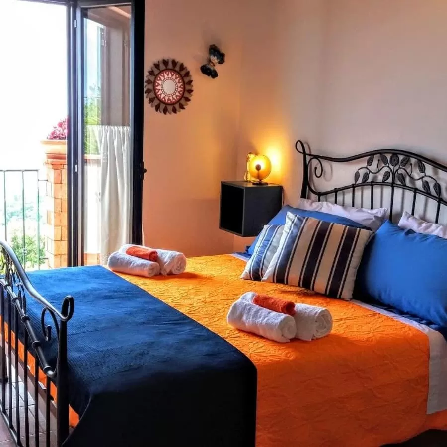 Bed in B&B Le Anthos