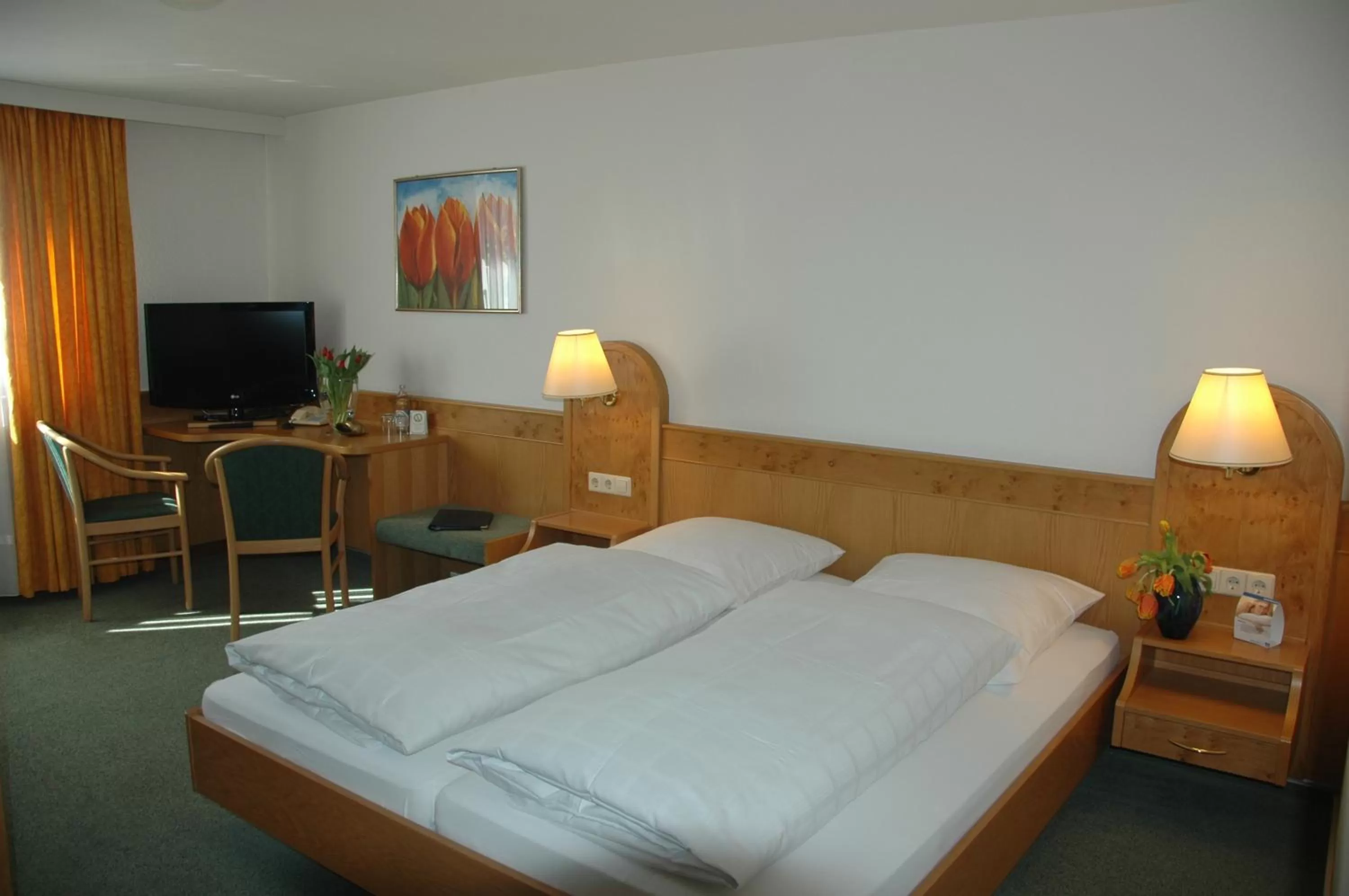 Photo of the whole room, Bed in Hotel Württemberger Hof Garni