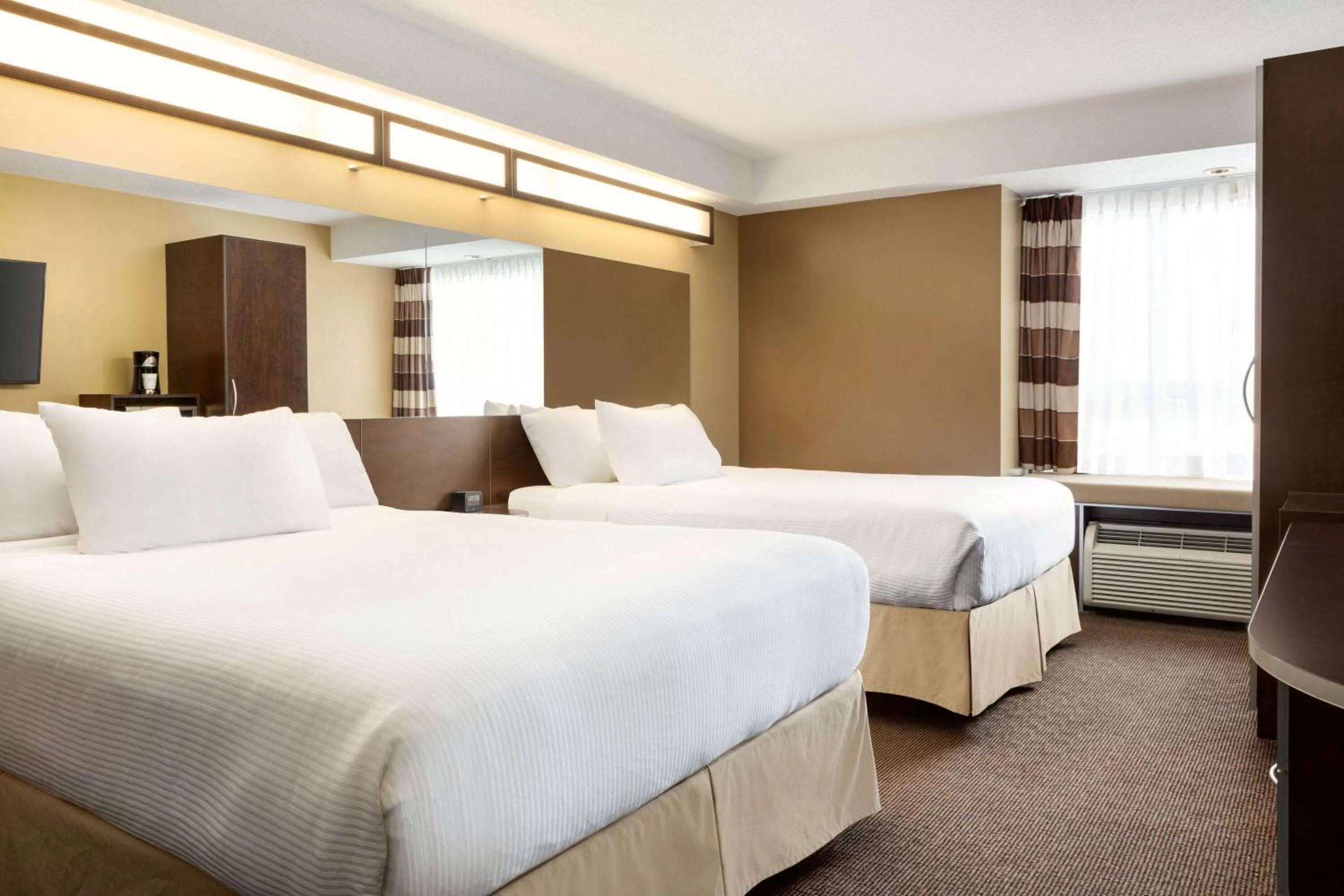 Photo of the whole room, Bed in Microtel Inn & Suites by Wyndham Estevan