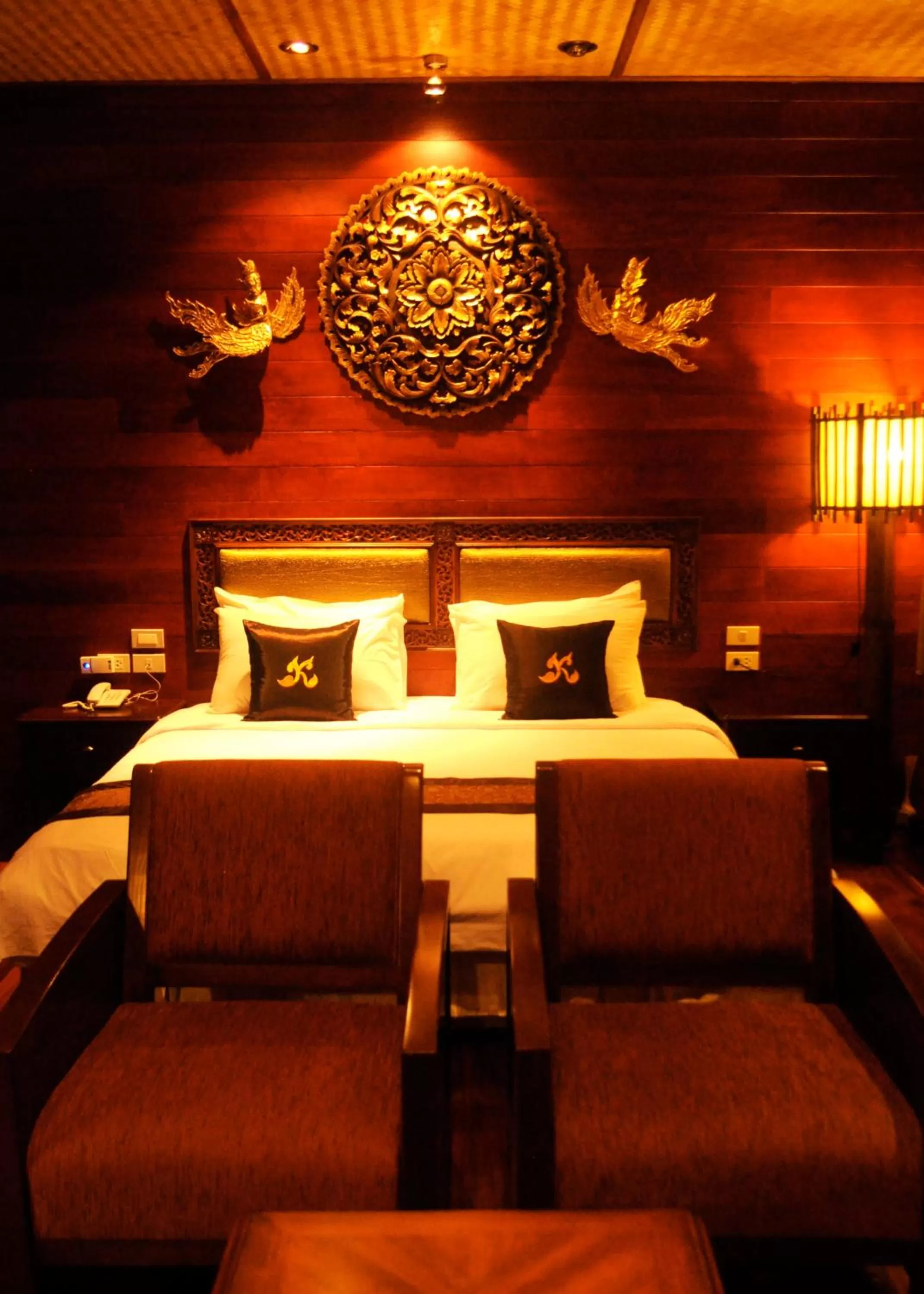 Bed in Ruenkanok Thaihouse Resort