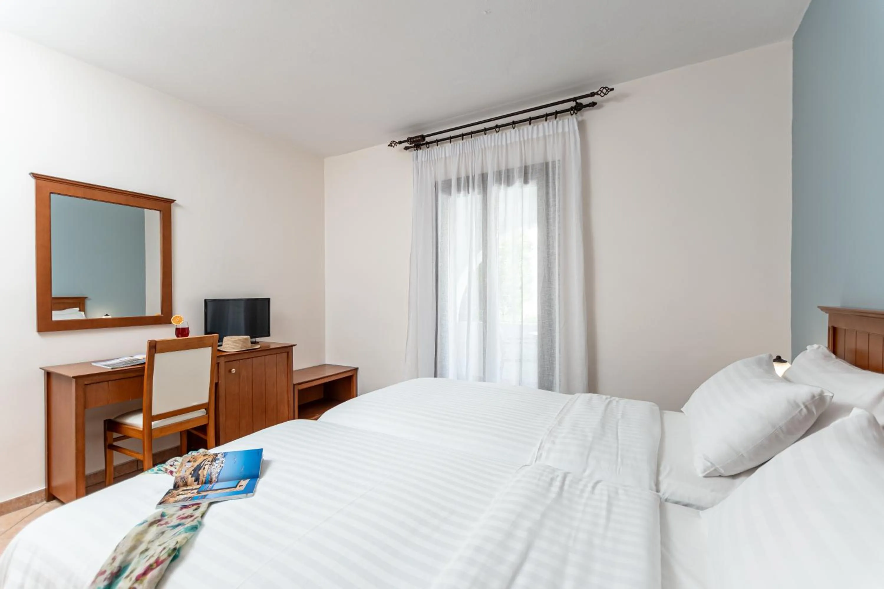 Bedroom in Naxos Resort Beach Hotel