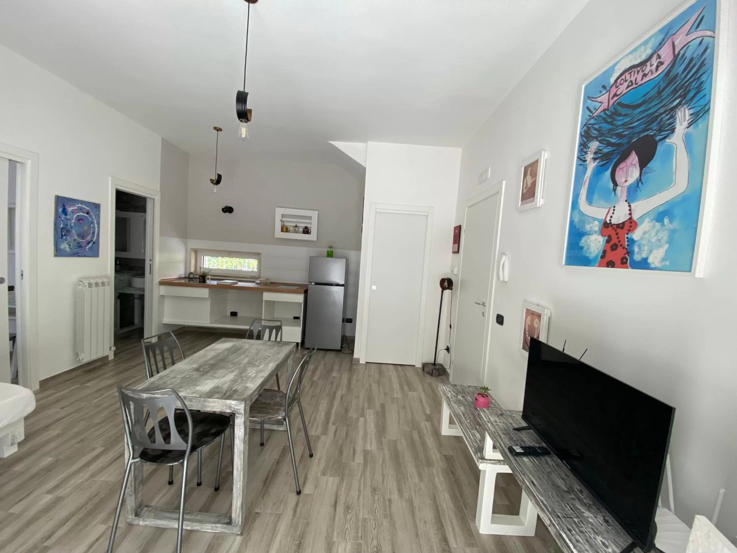 Living room, Kitchen/Kitchenette in La casa di Nina