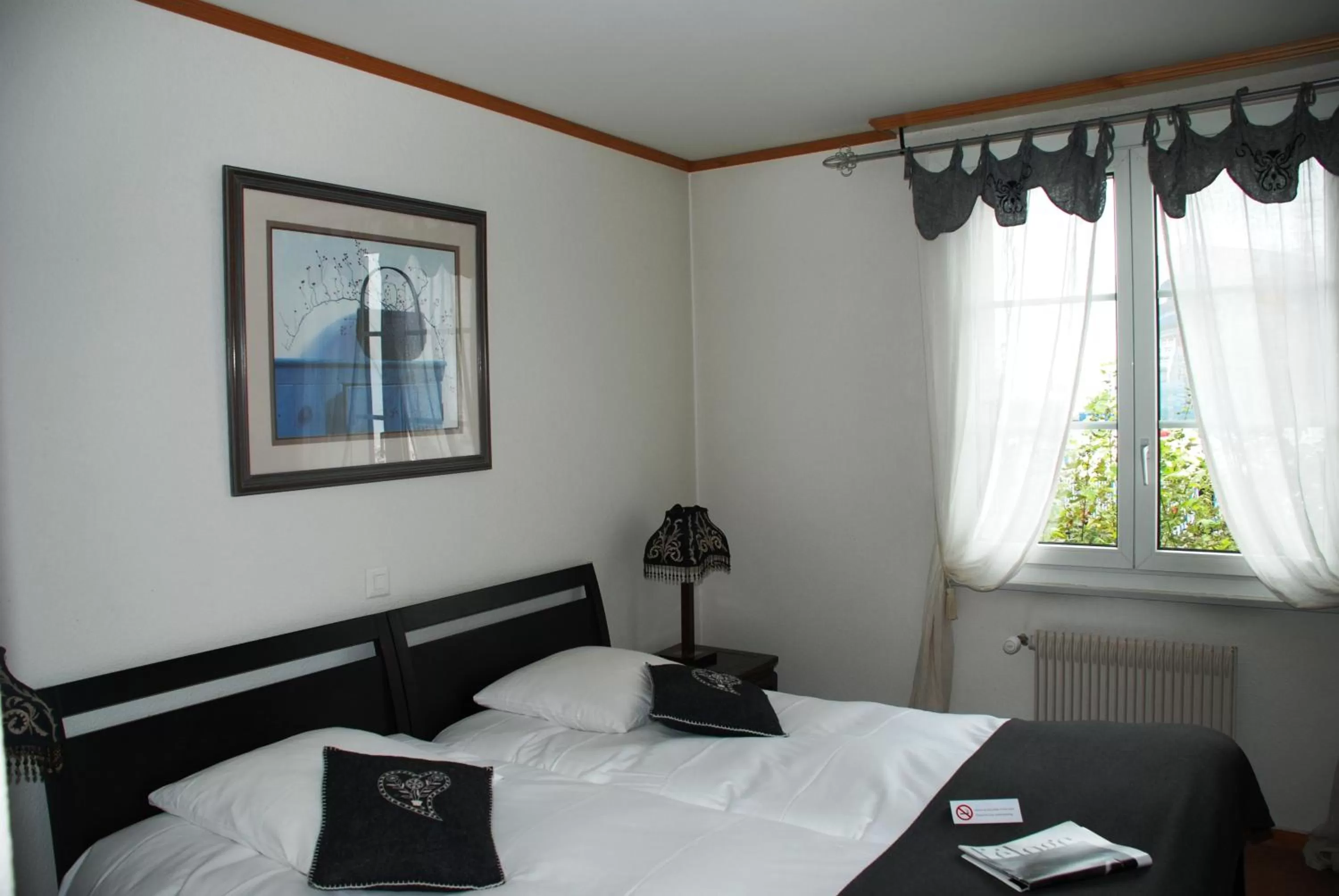 Bed in Hostellerie de Genève