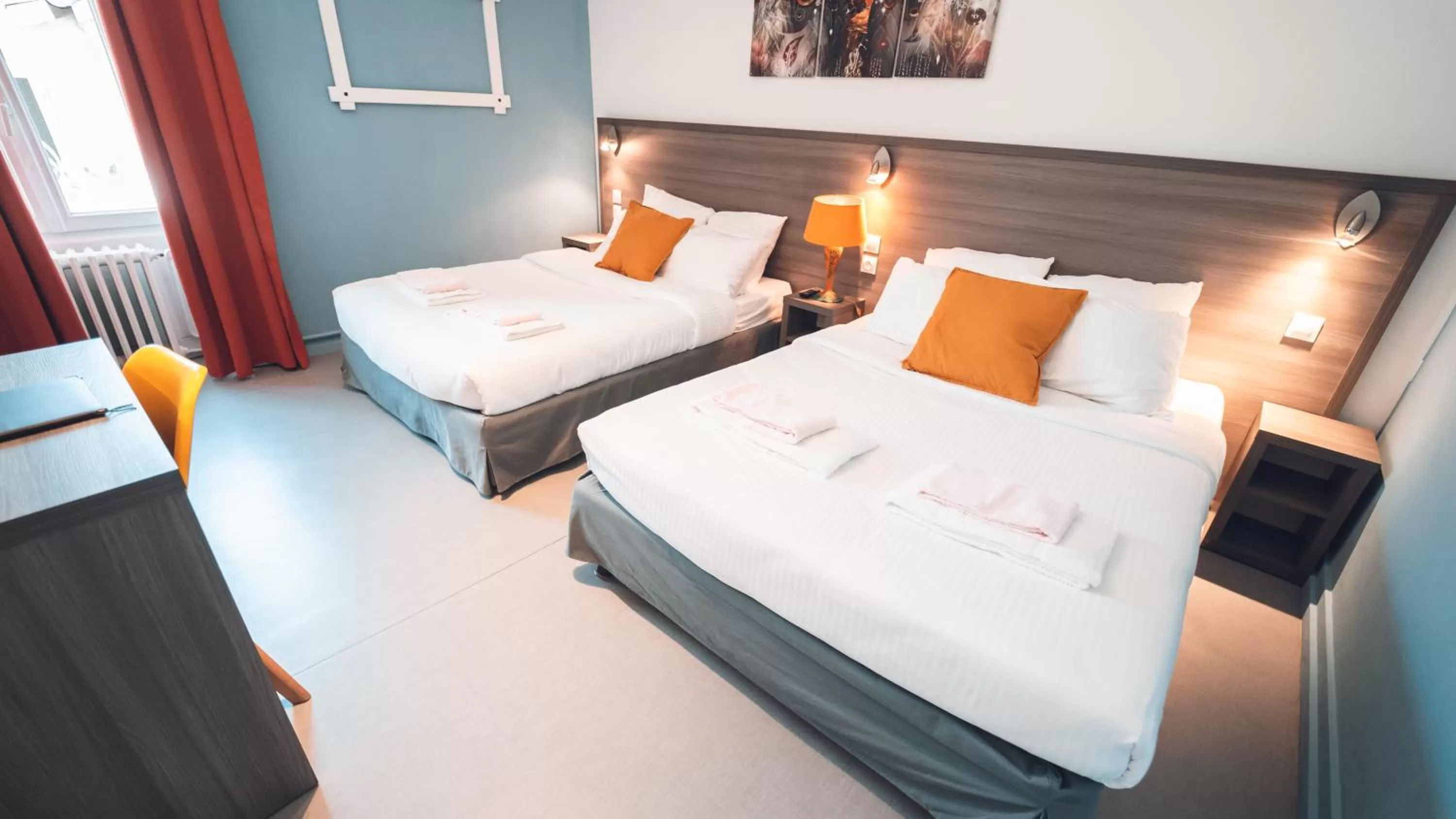 Bed in Logis Hôtel Vuillot