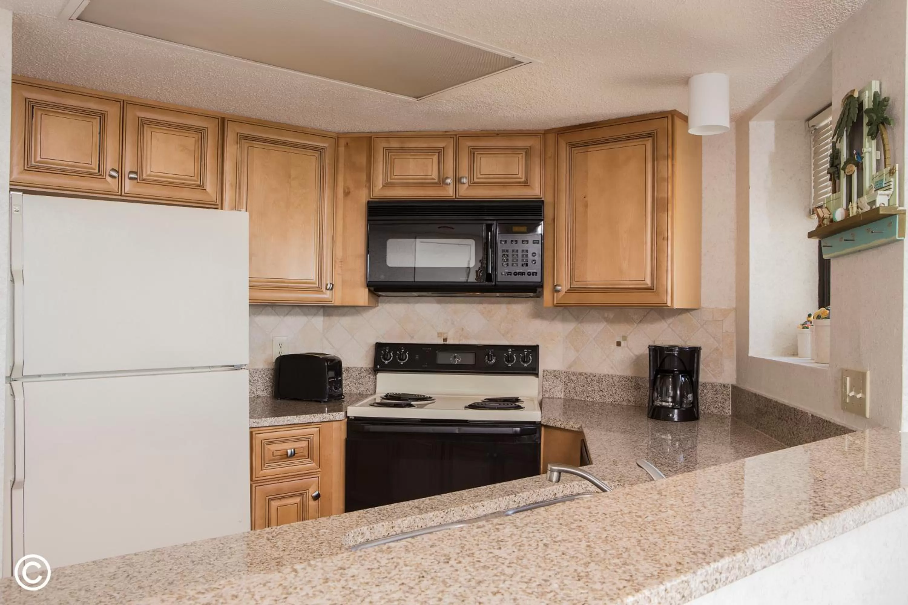 Kitchen or kitchenette in Beach Cove Resort