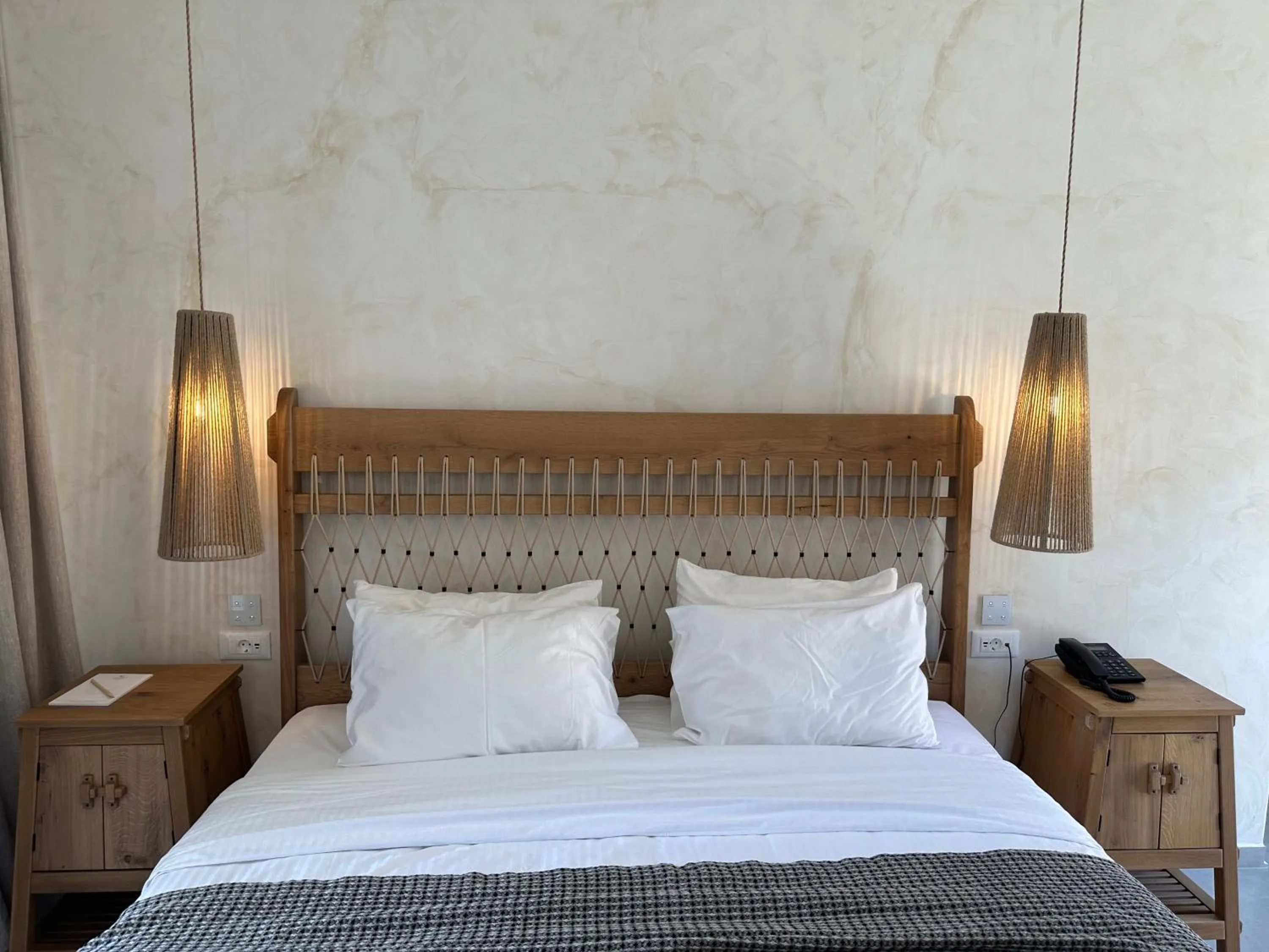 Bed in Panormos Village Hotel