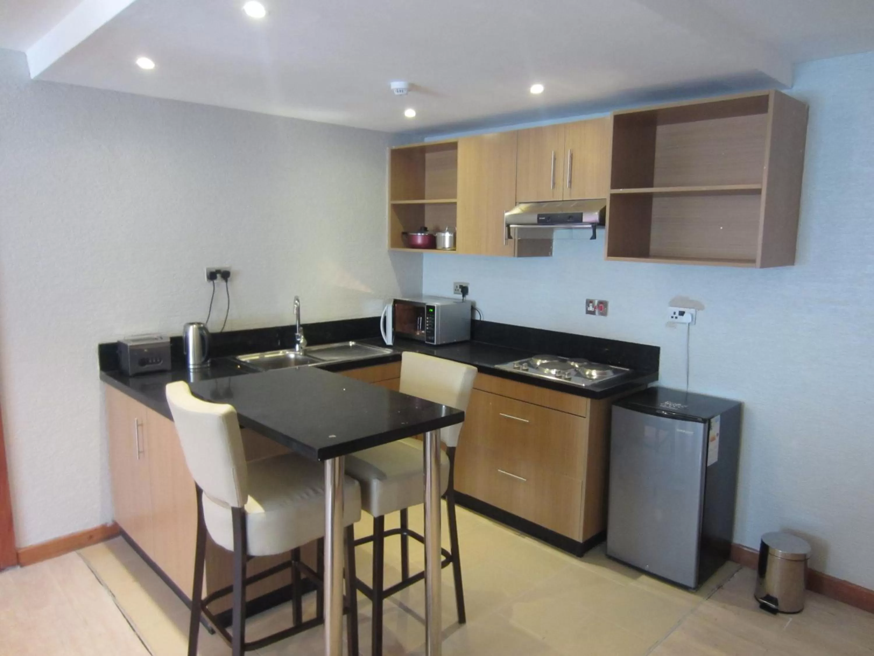 Kitchen or kitchenette in The Zehneria Hotel