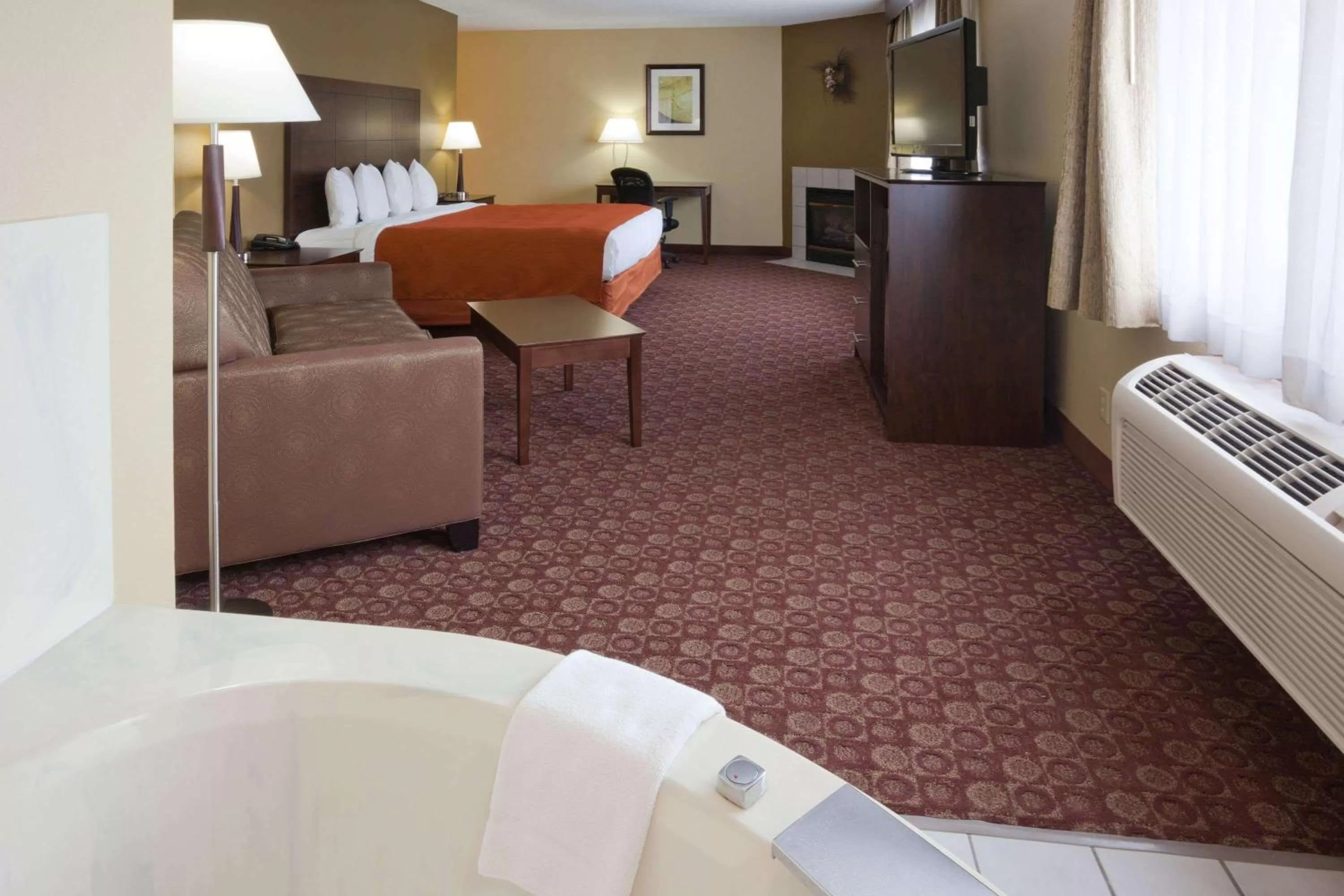 Photo of the whole room in AmericInn by Wyndham Blue Earth