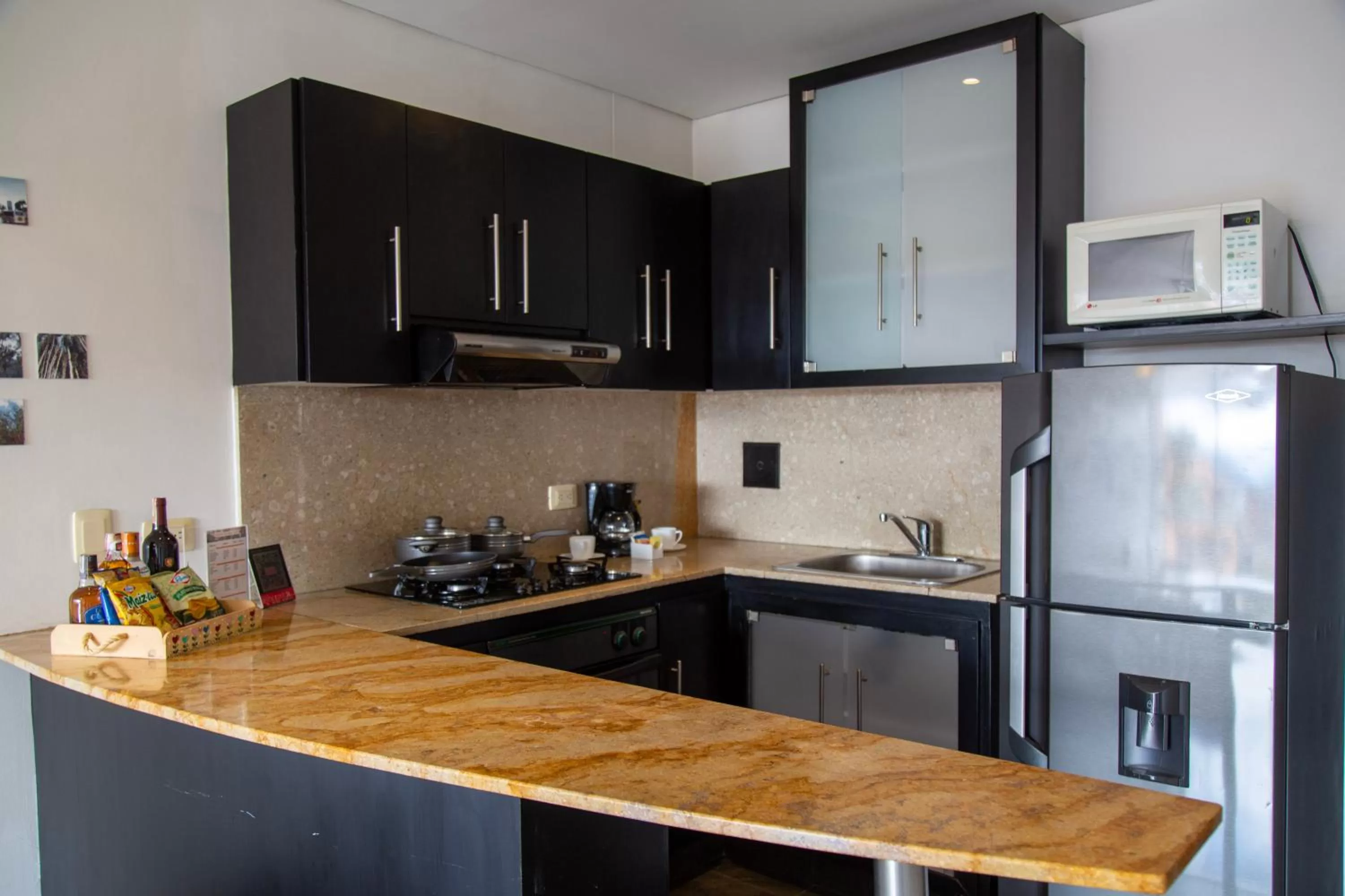 Kitchen or kitchenette in Hotel 104 Art Suites