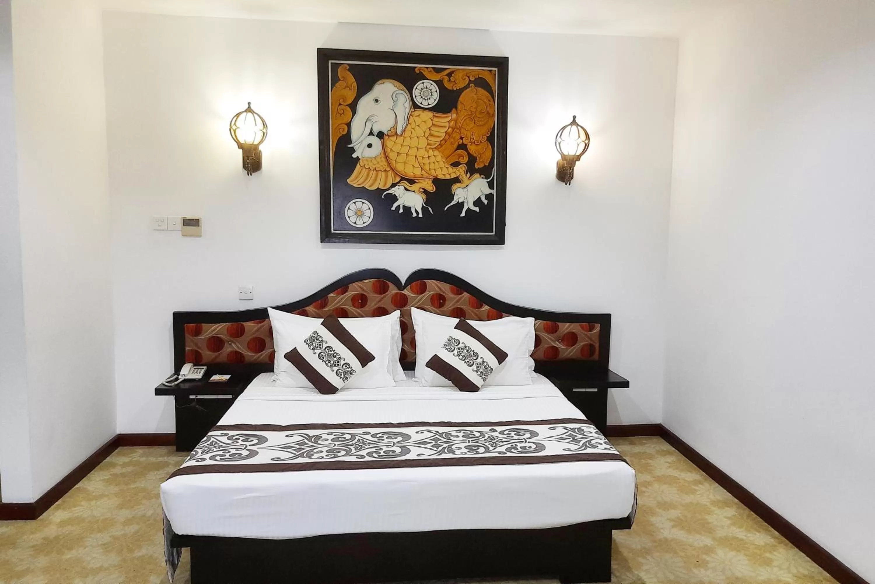 Bed in Royal Kandyan Hotel