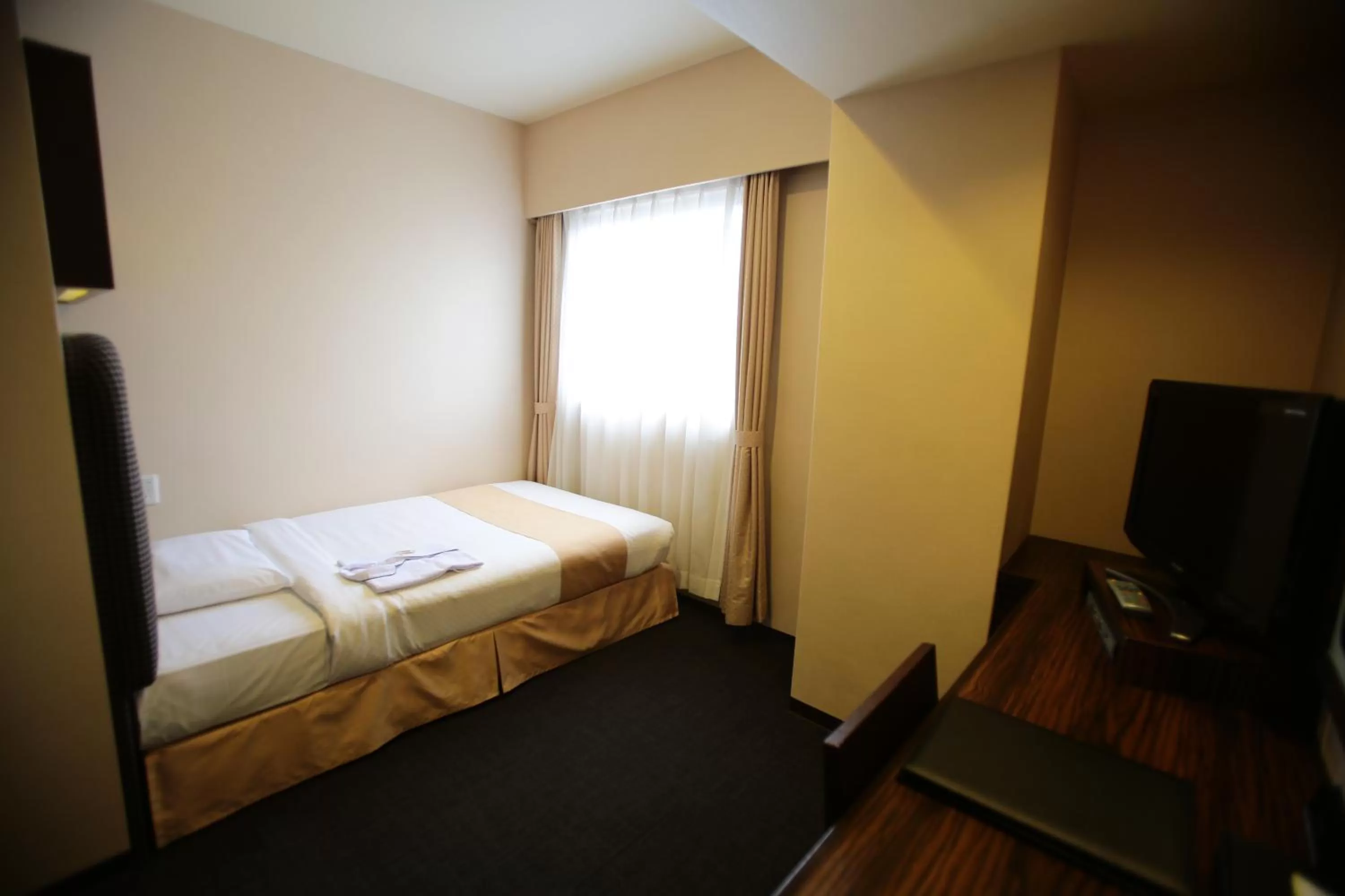 Photo of the whole room, Bed in International Hotel Ube