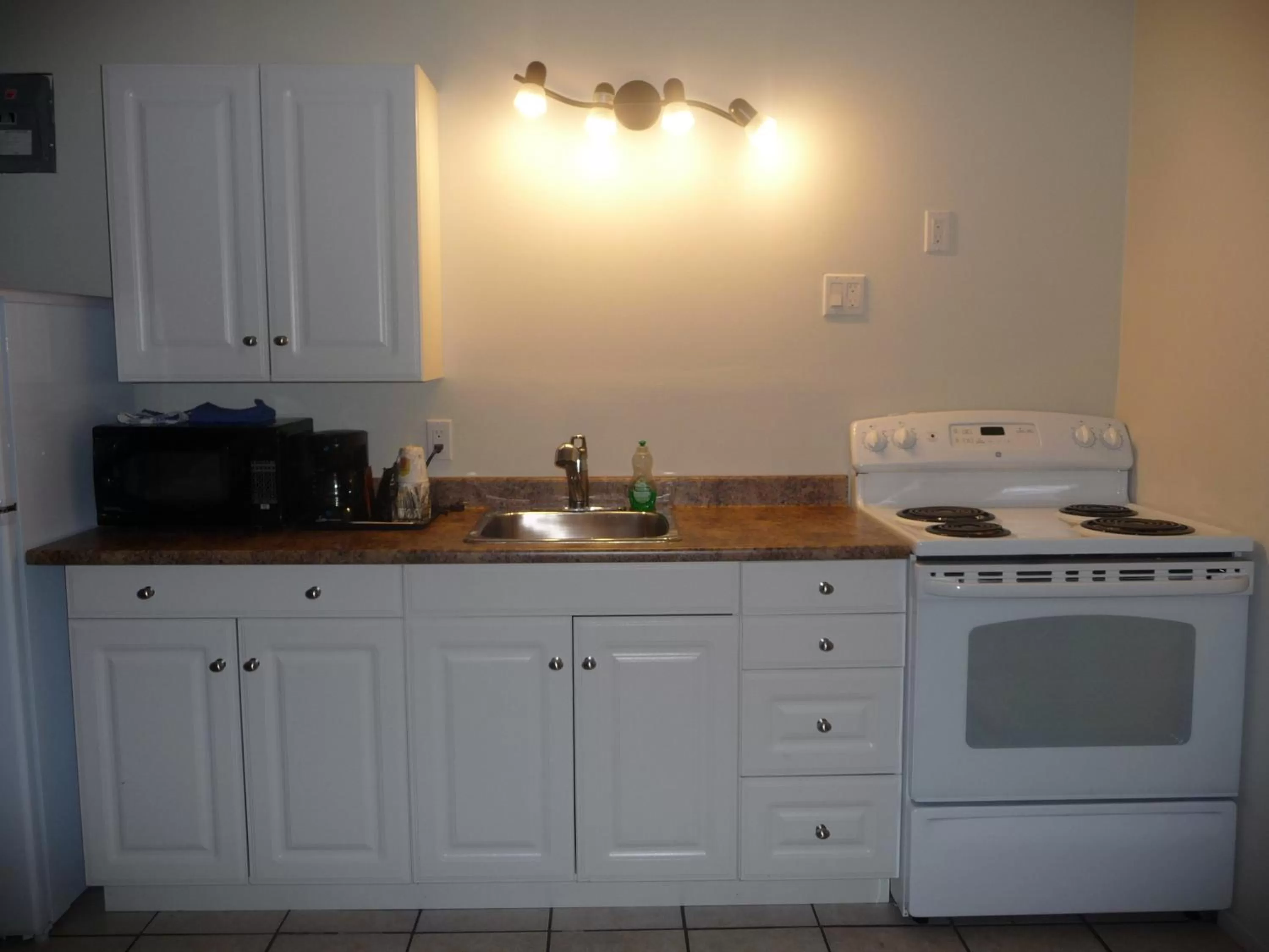 Kitchen or kitchenette in Super 8 by Wyndham Kamloops East