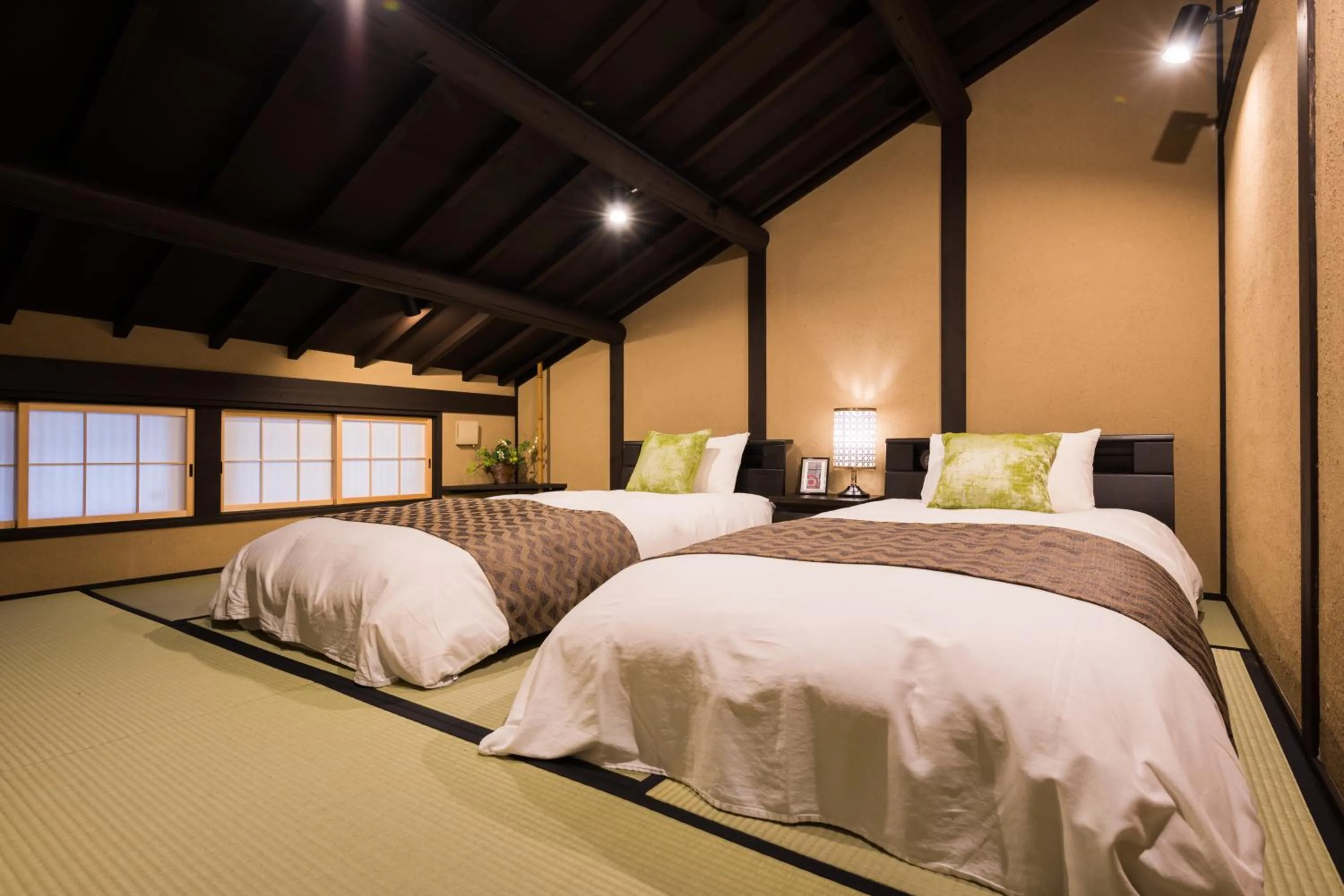 Bed in Kyomachiya Stay Takasegawa Shichijo