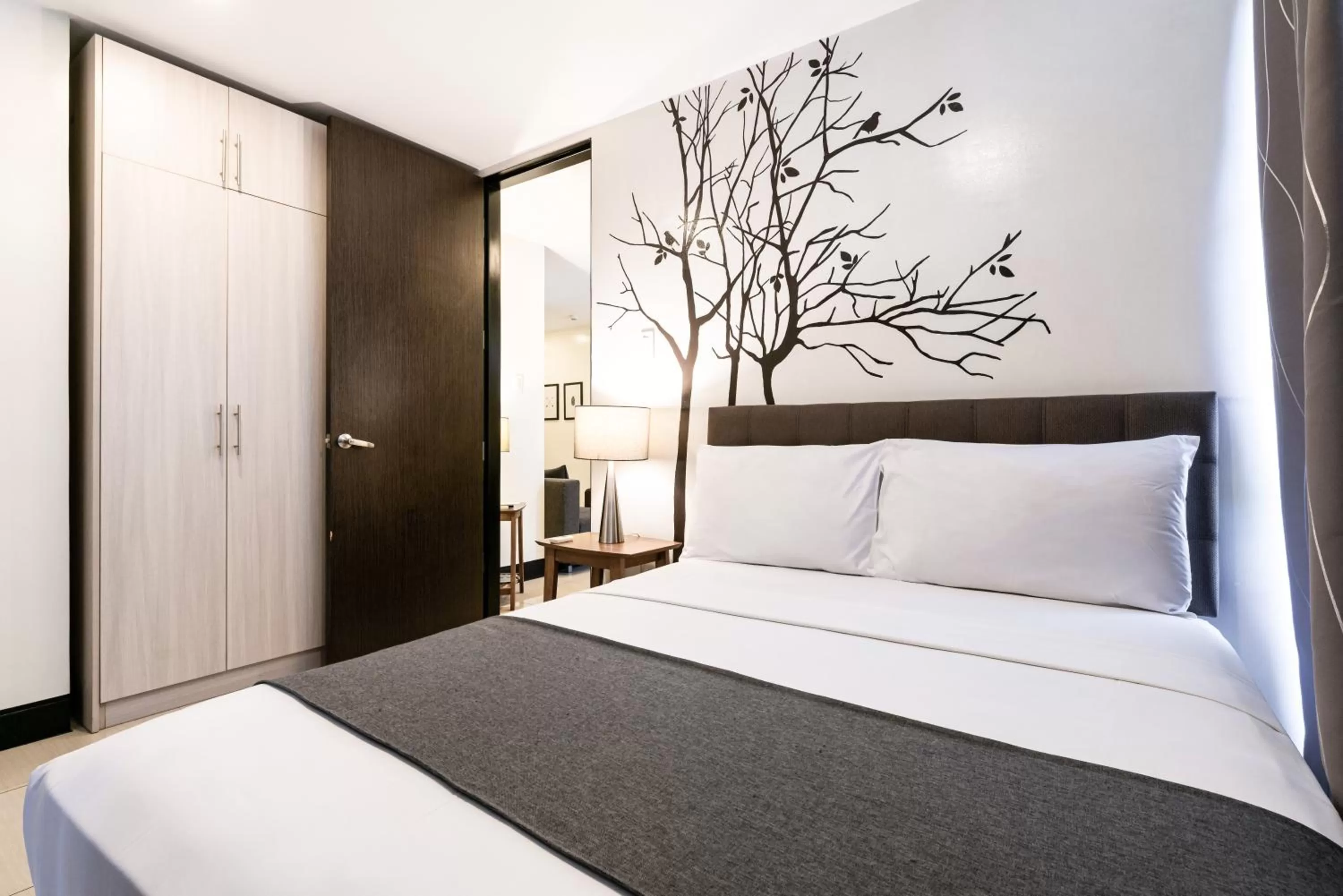 Bedroom, Bed in Artemis Place Makati Hotel