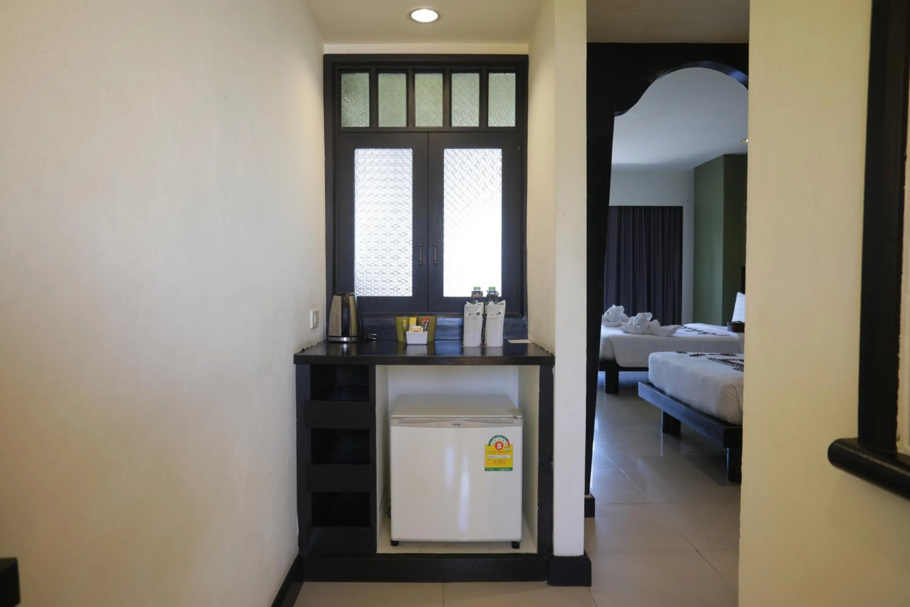 Coffee/tea facilities, Bed in Woraburi Phuket Resort & Spa - SHA Plus