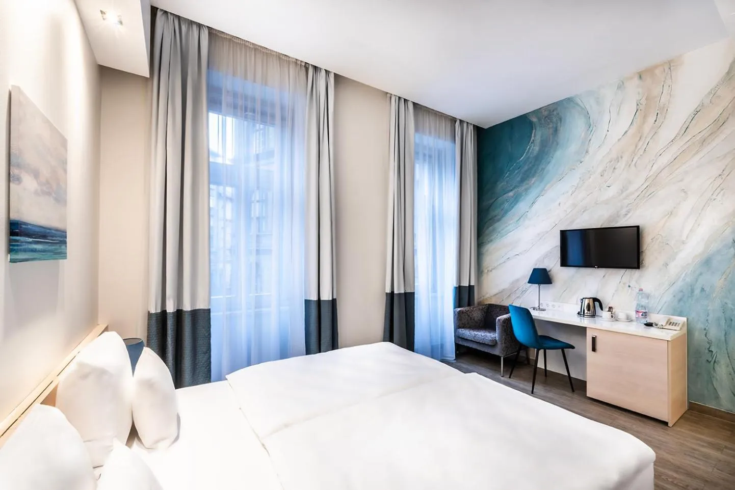 Bed in Atrium Fashion Hotel