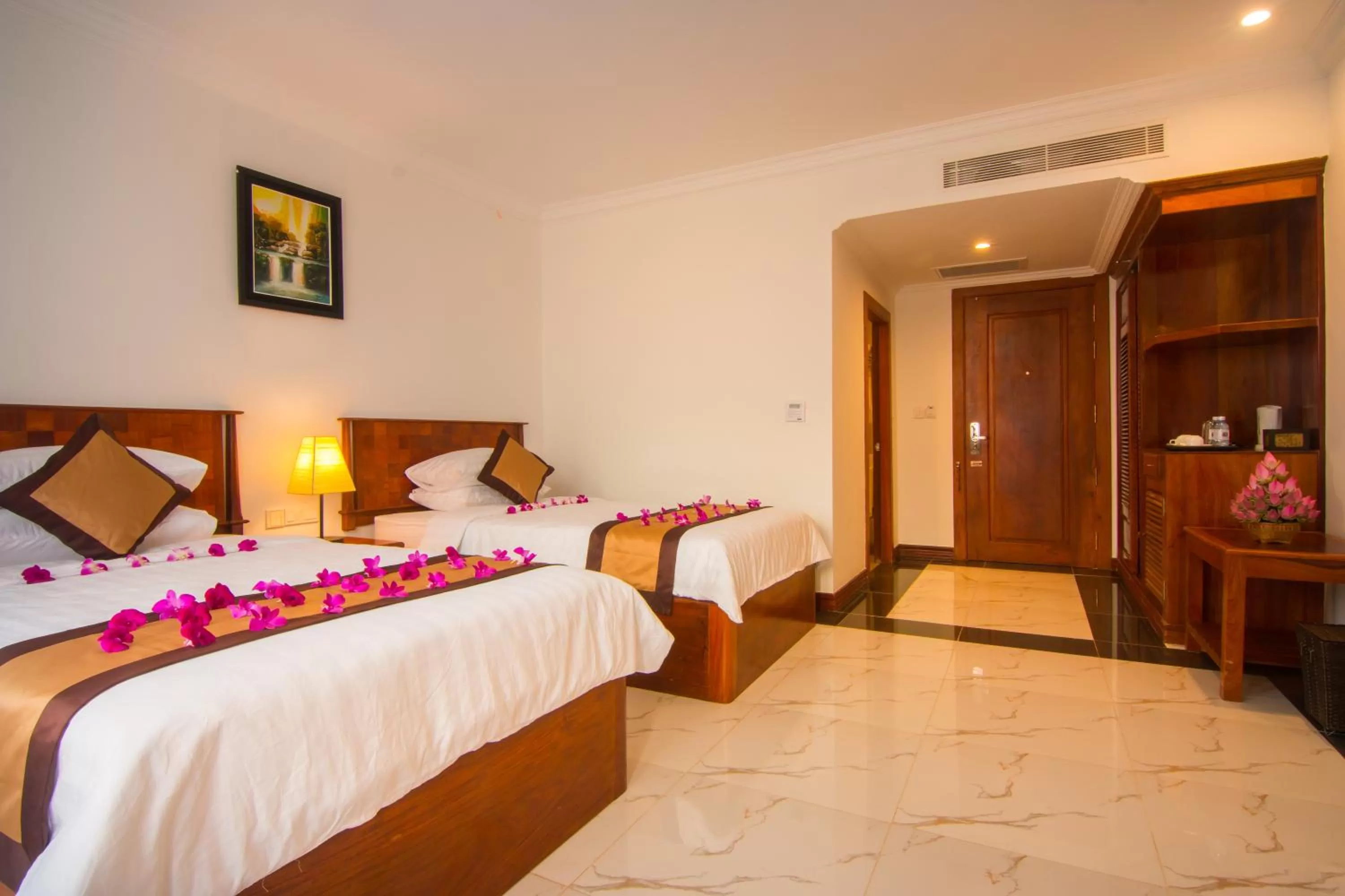 Bed in Glorious Hotel